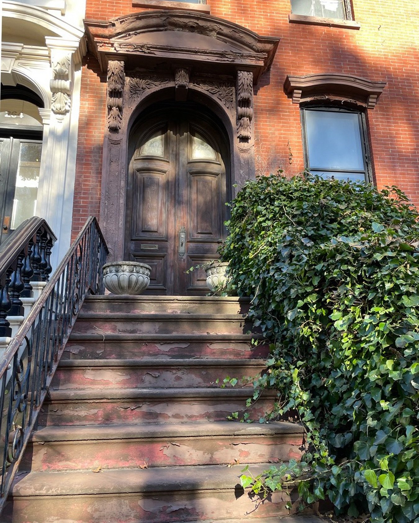 🚪 Embrace the climb up the steep stoop, nature&rsquo;s got a leg up on you! A charming reminder that every challenge holds its own unique beauty. We are in love with this door, and we know you will be too. 

#WelcomeHomeJC  #CharmingDoors #DiscoverJ