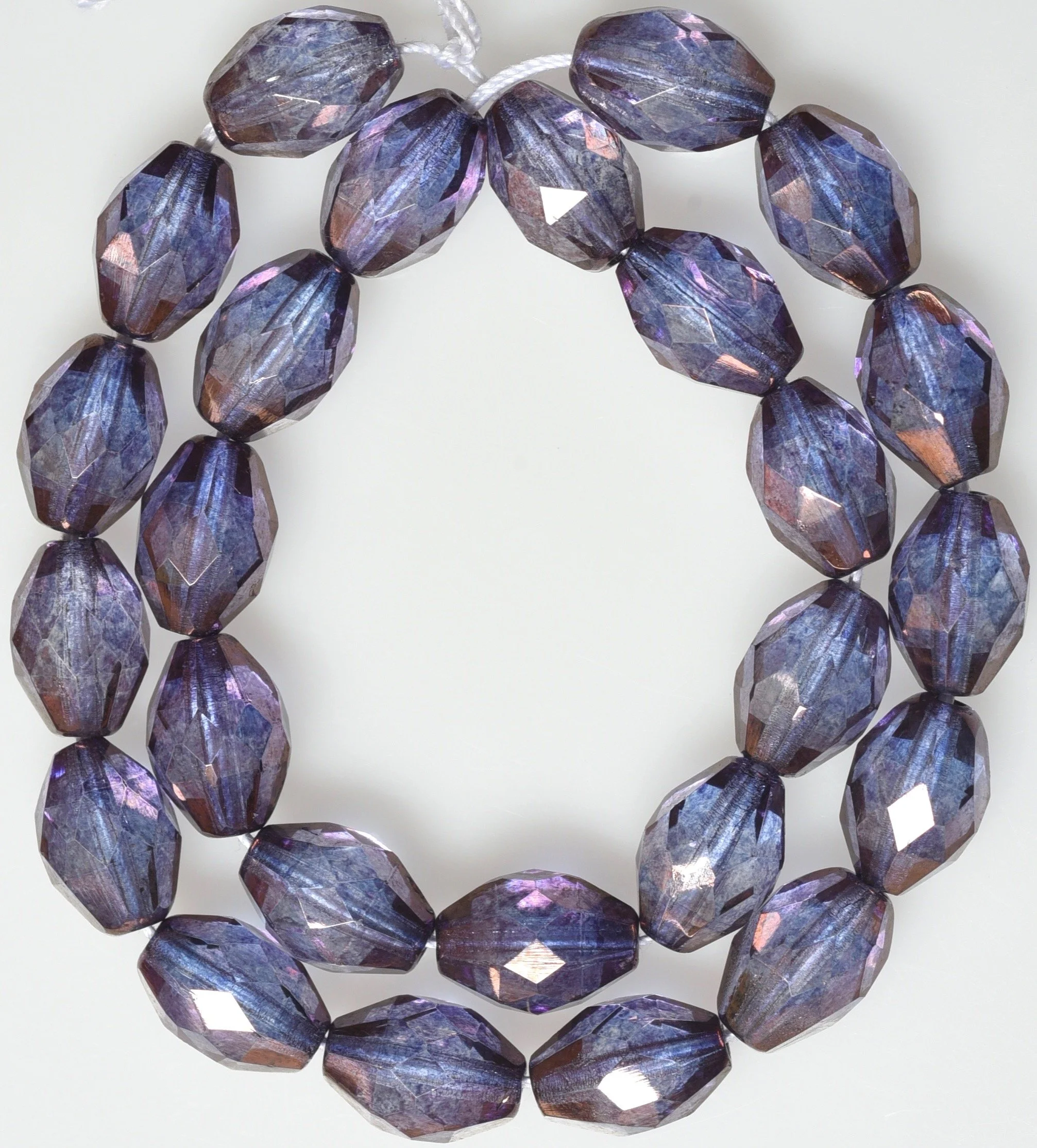 CZ-716 Oval Fire Polished beads 8 x 11mm, Luster and Iris Colors,