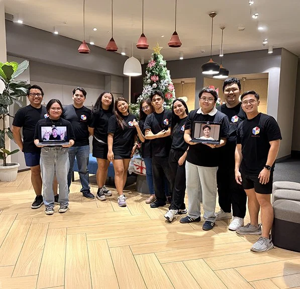 Masaya team group photo in the office celebrating together