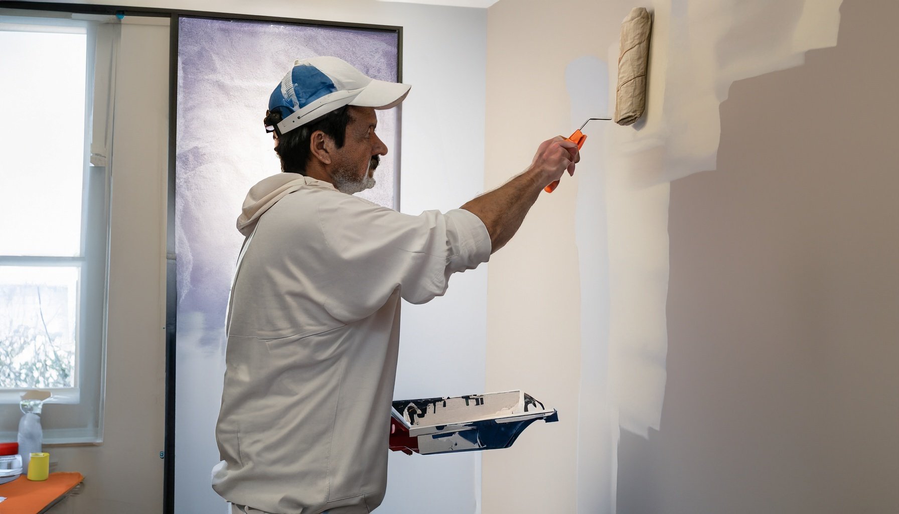 Firefly painter and decorator wearing white painting a living room 15833.jpg