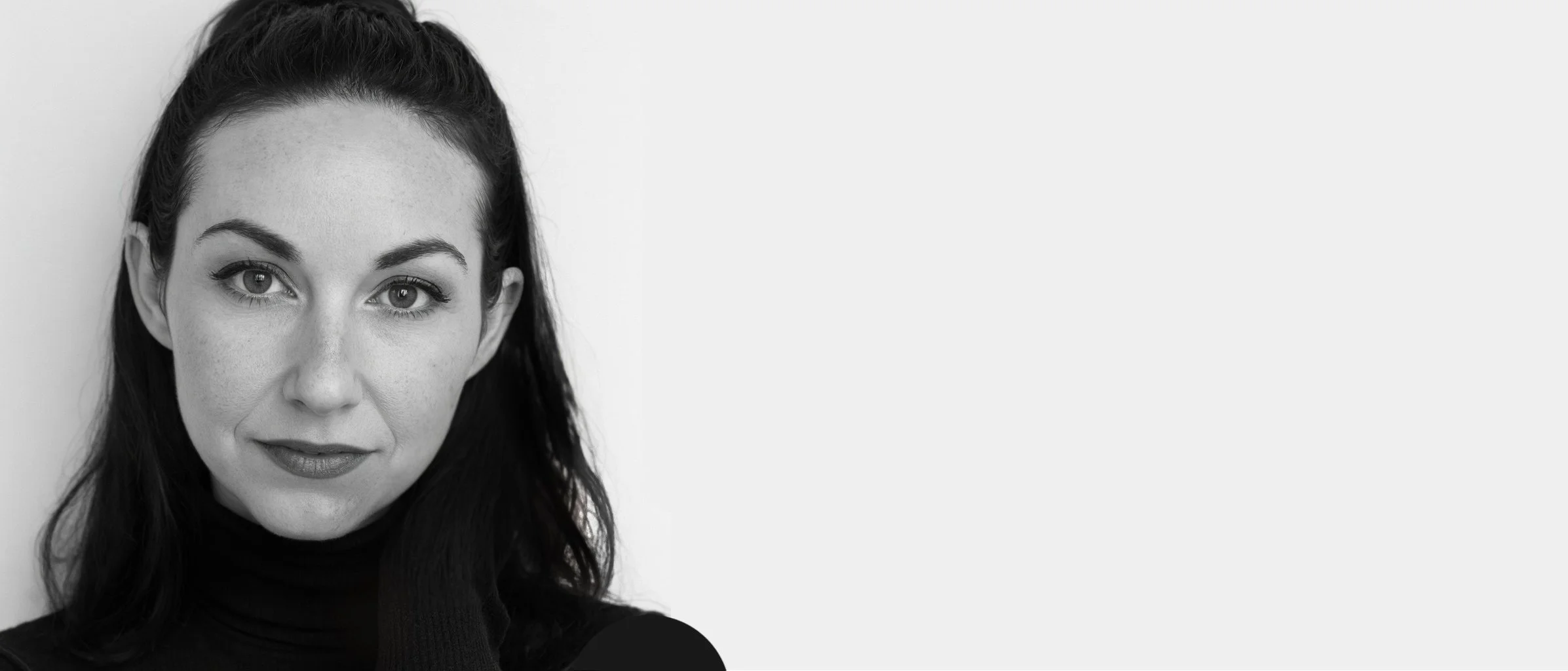Black and white portrait of Brooke Hall