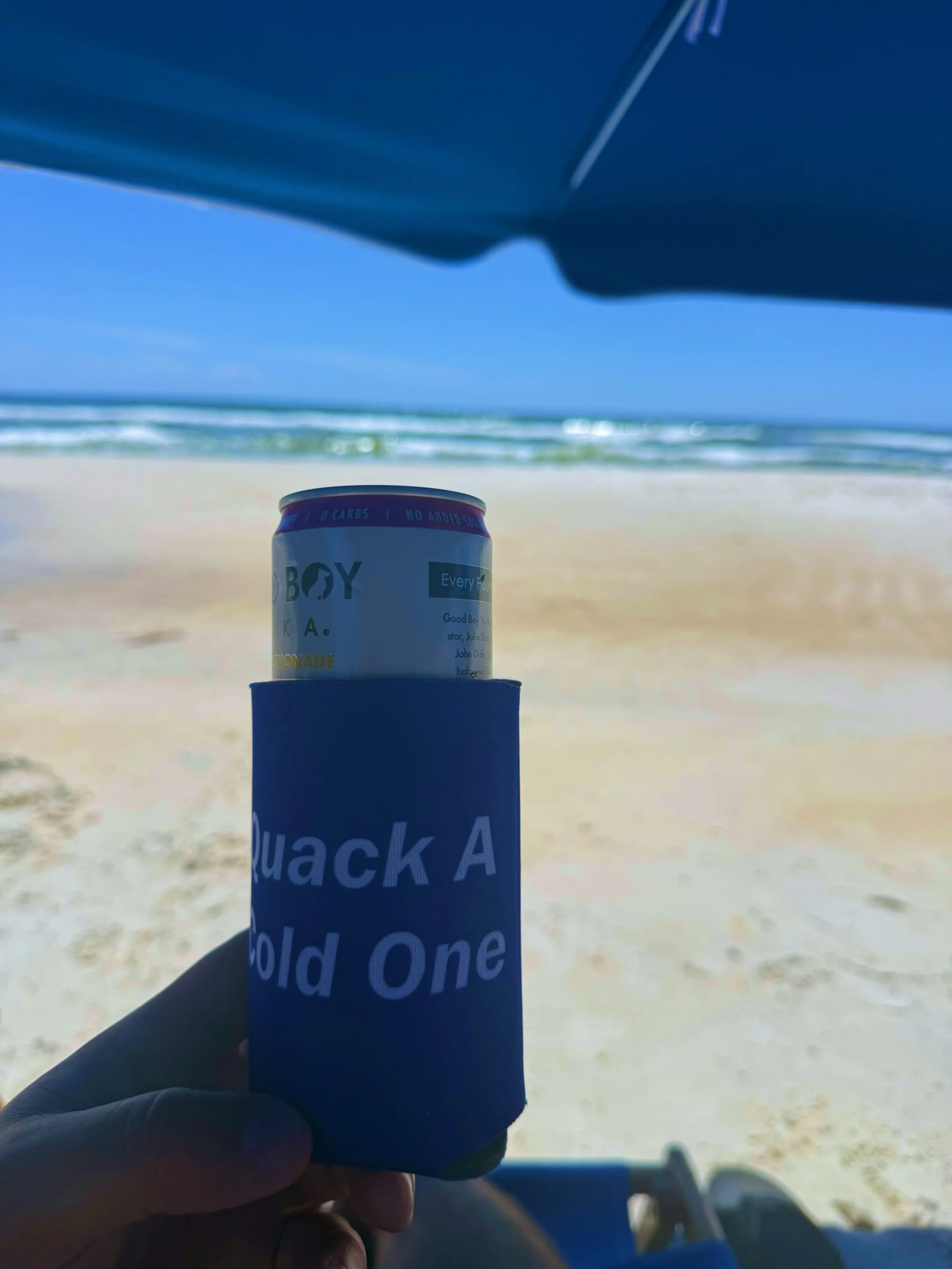 Our Sanders duck koozie made it to the beach! 🦆🌊 We love seeing where our duck ends up. Thanks for taking us along!