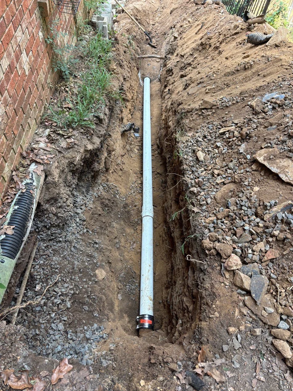 Our team had a tight job to do when they had to take the sewer line and reroute it up a hill towards the HVAC condenser. Things are going to run much more smoothly now!