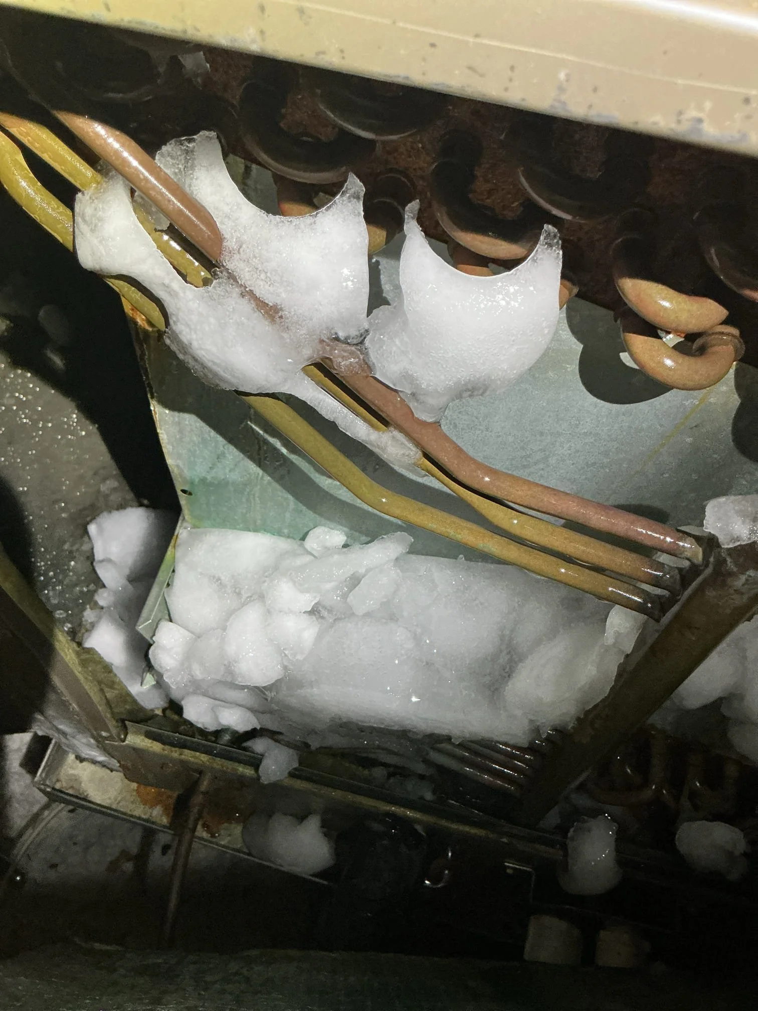 Why Does My AC Freeze Up When It’s Hot Outside? Causes, Fixes &amp; HVAC Maintenance