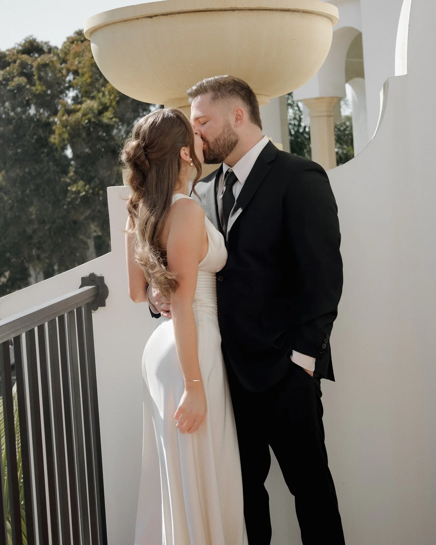 A private balcony moment after an intimate ceremony at the Santa Barbara Courthouse&mdash;a memory revisited