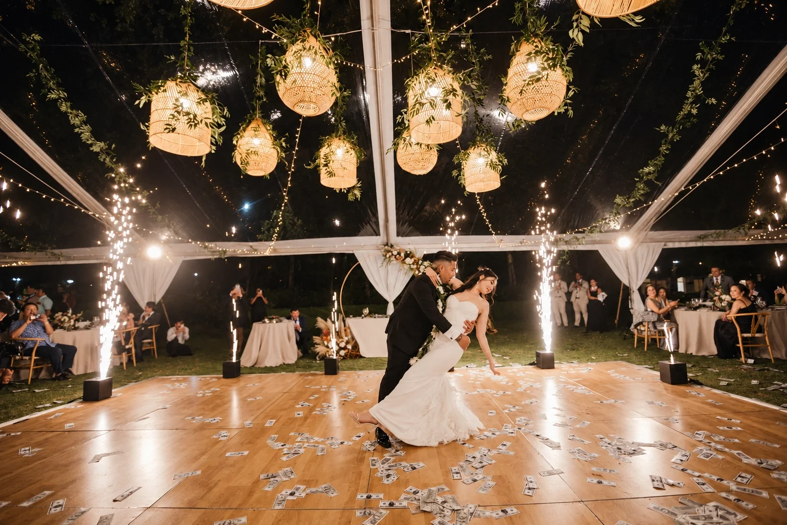 Nighttime wedding dip under sparklers.webp