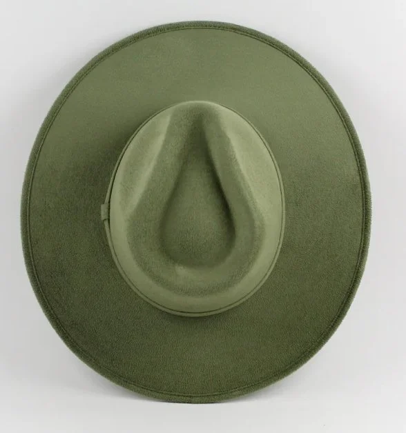 Top view of a green cowboy hat with a wide brim.