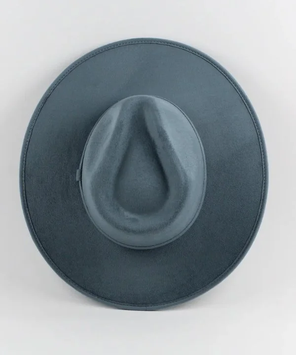 Black cowboy hat viewed from above, showing the crown and brim.