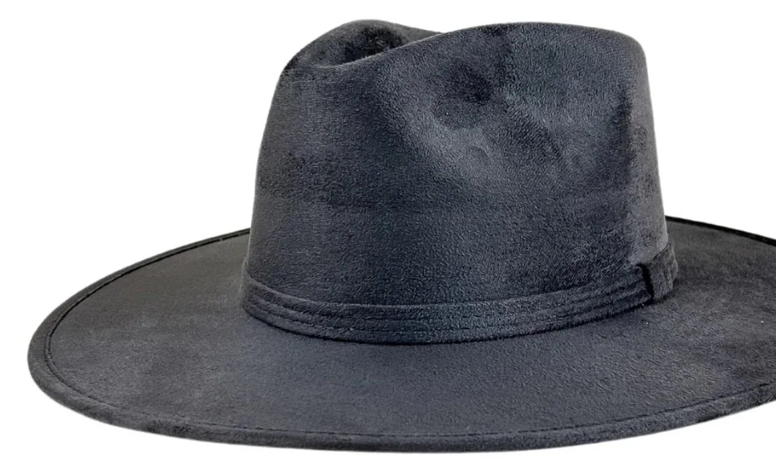 Black cowboy hat with wide brim and crease on top