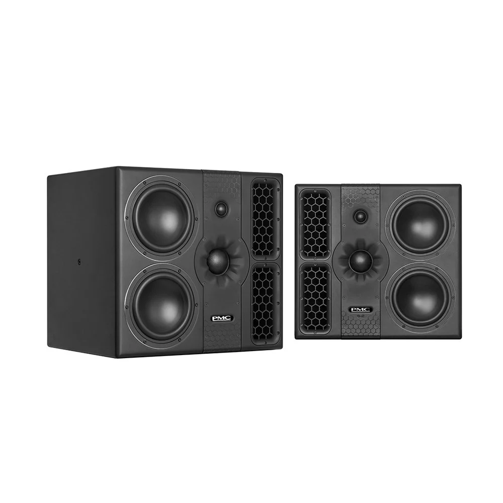 Pair of black bookshelf speakers with multiple drivers and venting on a white background.