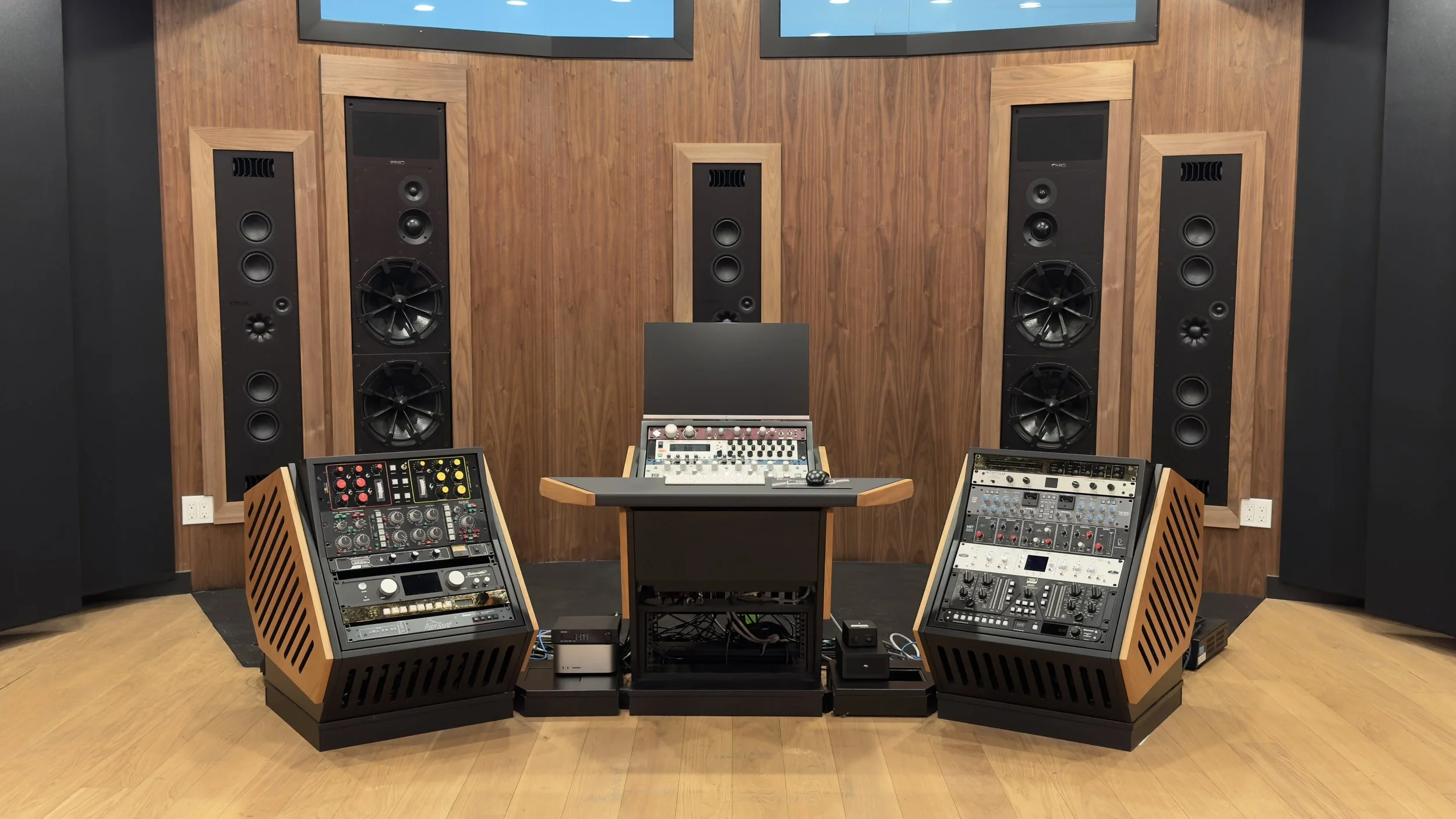 Front wall of Paris Lee Mastering atmos studio viewed from behind mix position