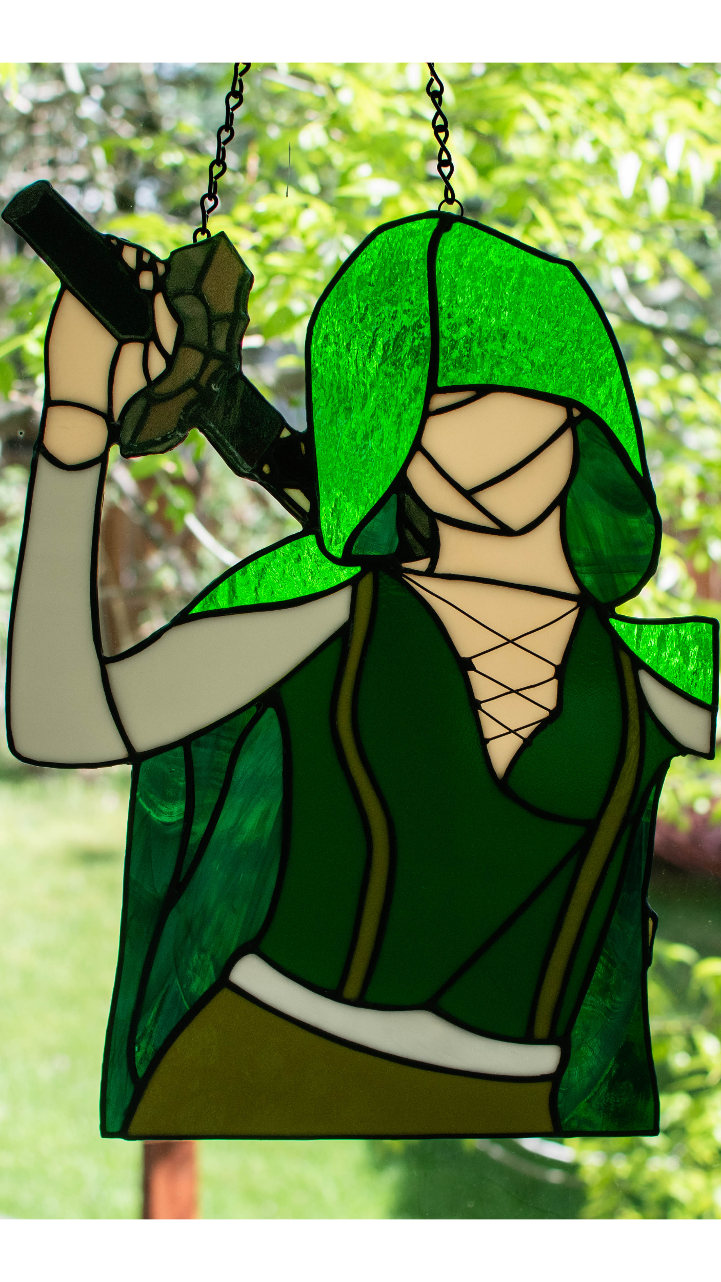green hooded swordswoman v2 squarespace resize.png