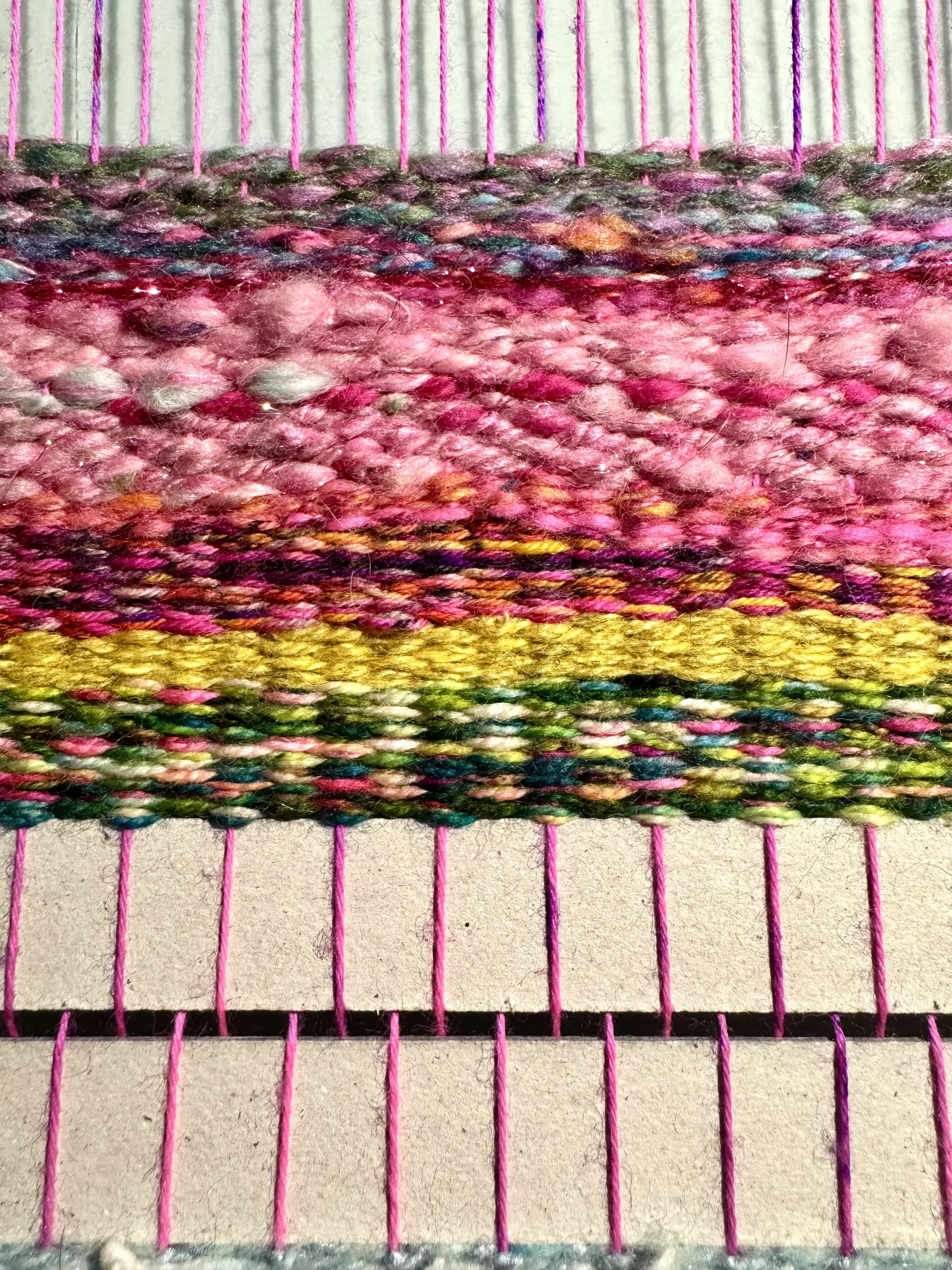 Weaving on Loom - Pink/Green/Yellow