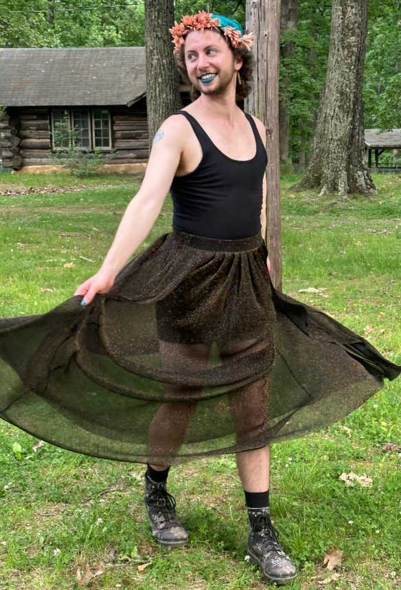 A portrait of River, who teaches the Not Broke Anymore Workshop