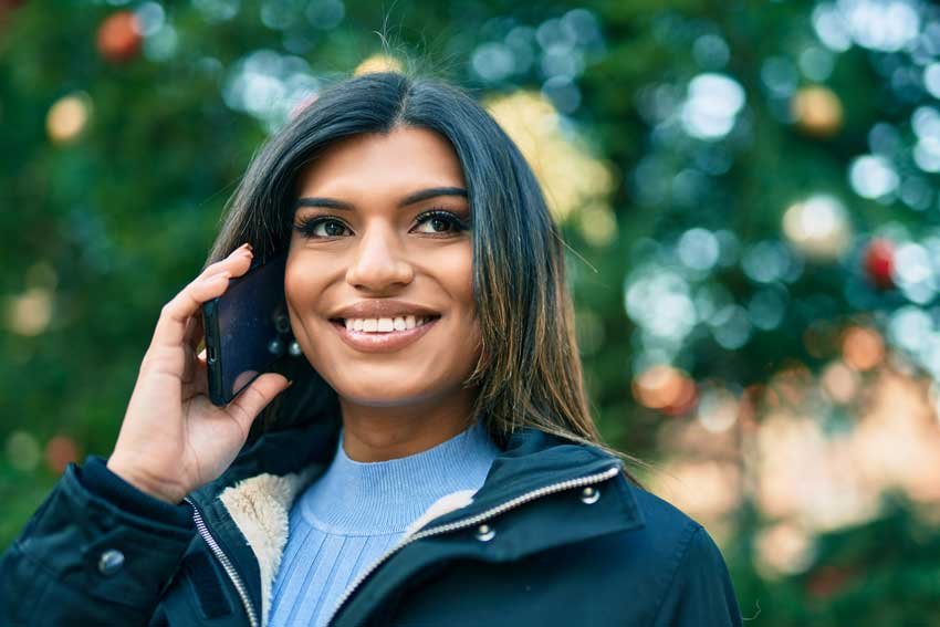 Smiling woman on phone