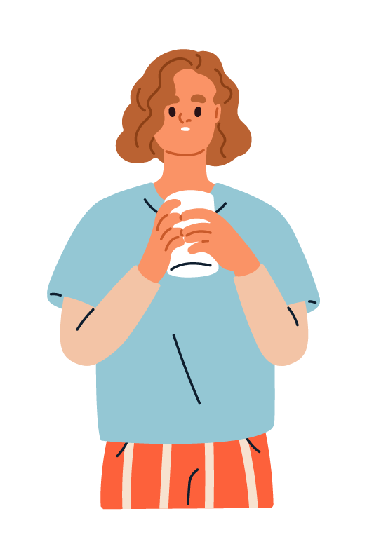 Jamie holding a cup of coffee