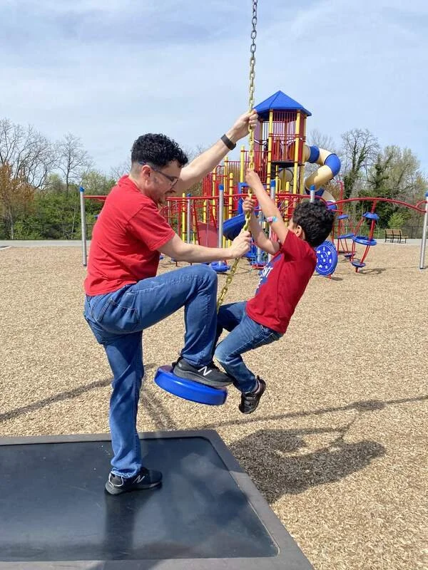 Alexander playing with his family