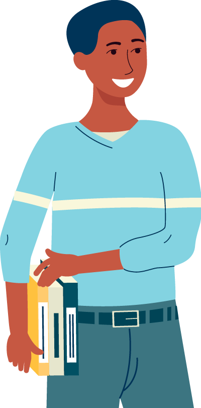 Joshua holding school books and smiling
