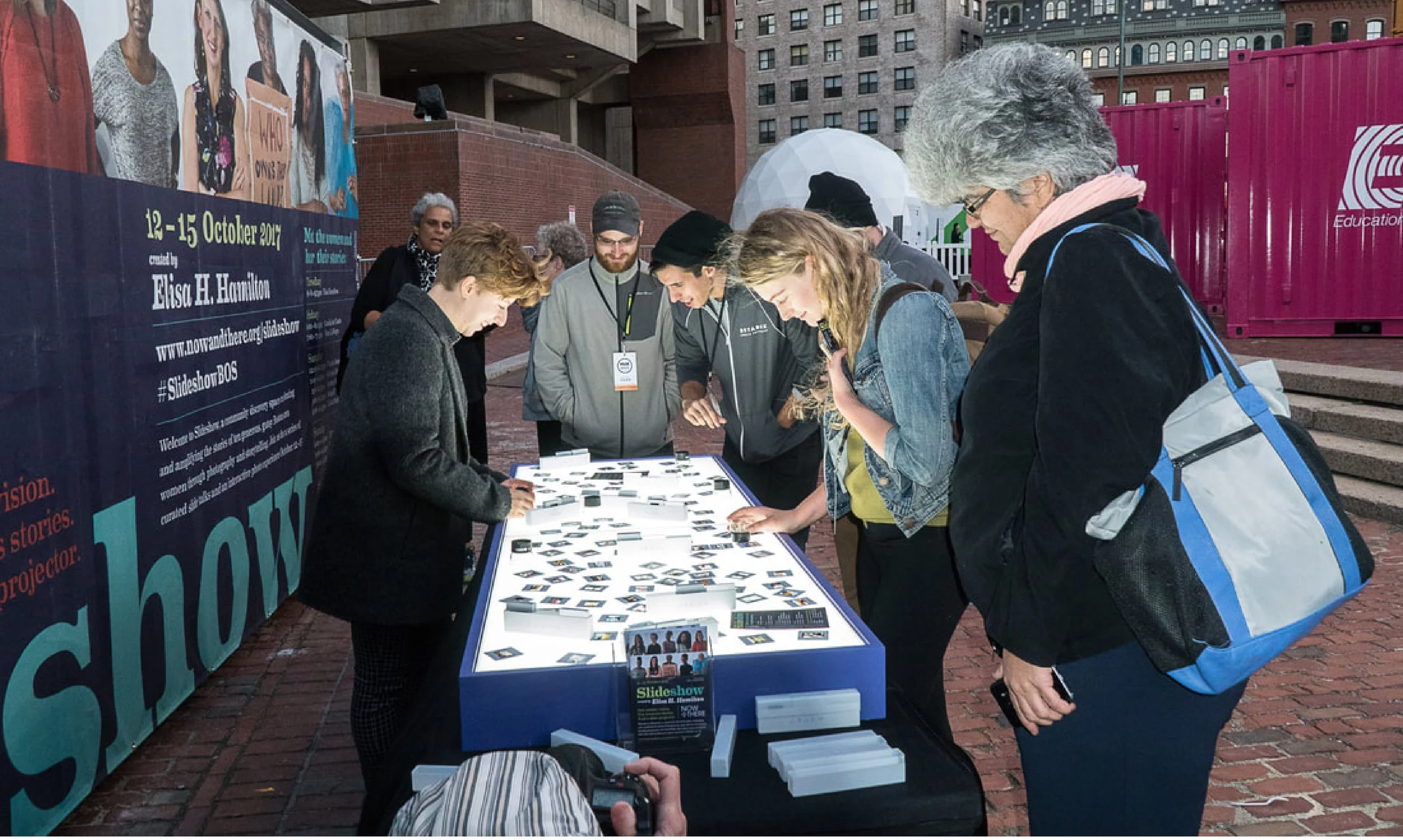 People viewing interactive photo experience