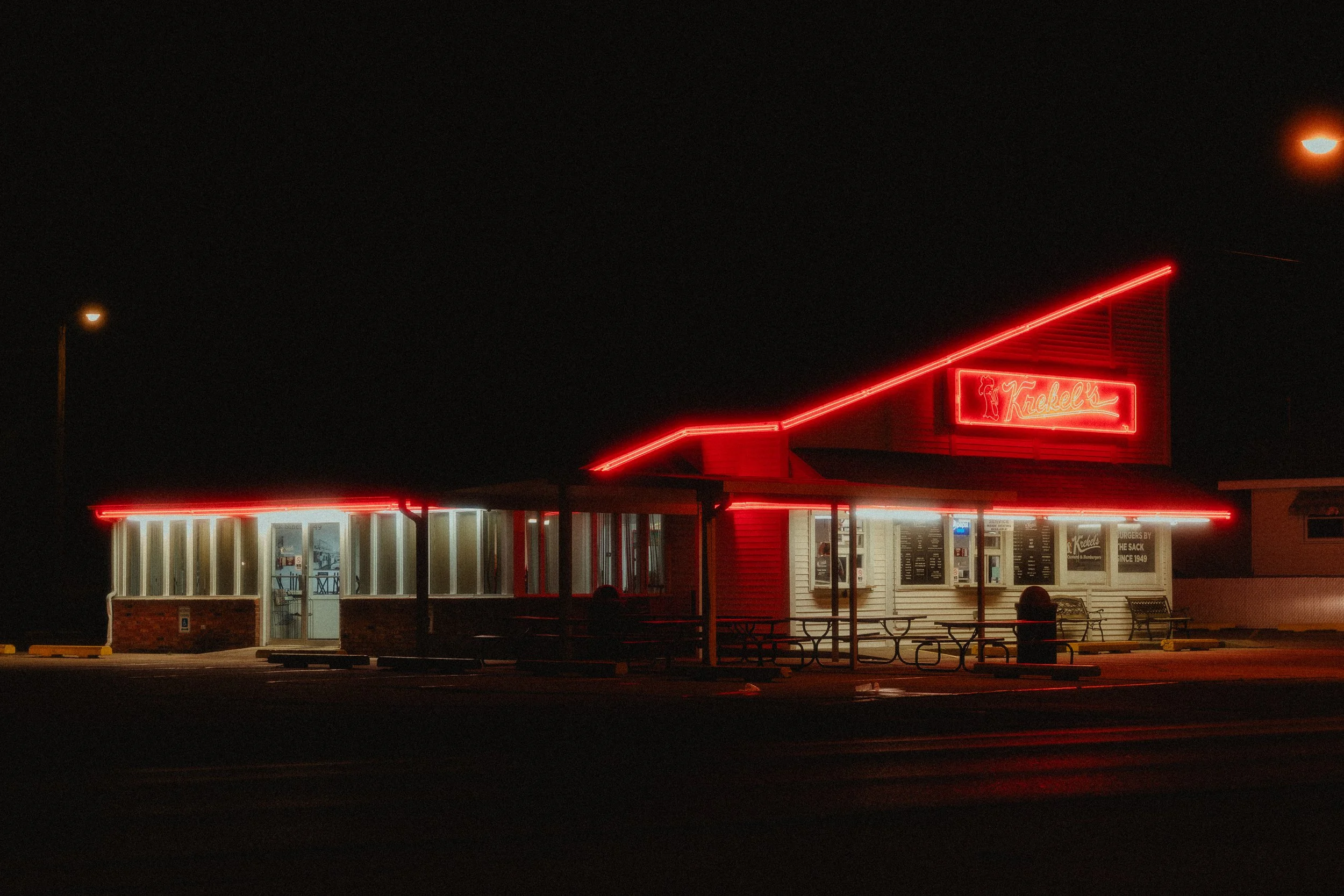 street scene krekel's hamburger stand red neons at night in springfield illinois