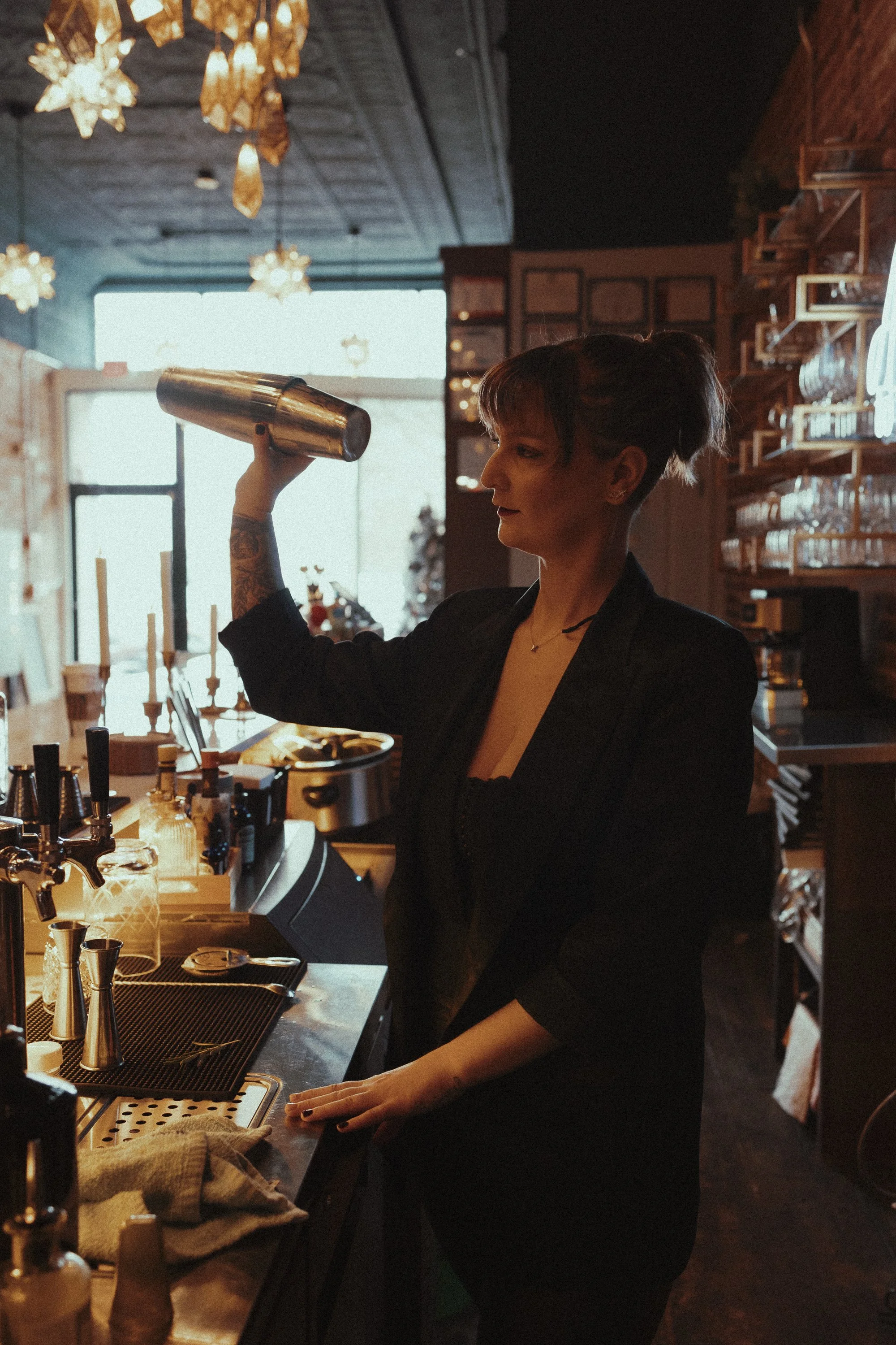 branding portrait bartender shaking cocktail at Ad Astra in Springfield IL