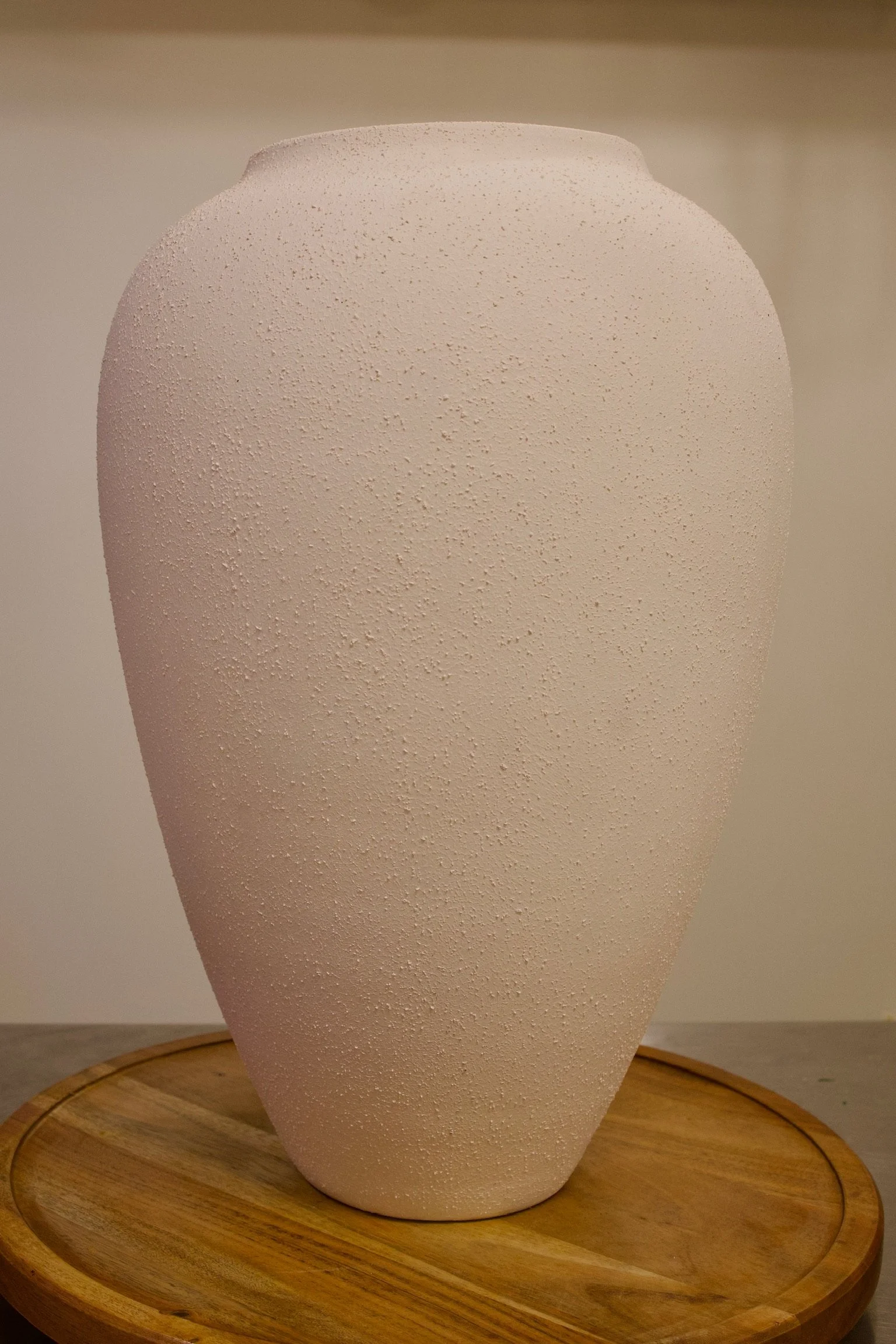 Tan ceramic floor vase