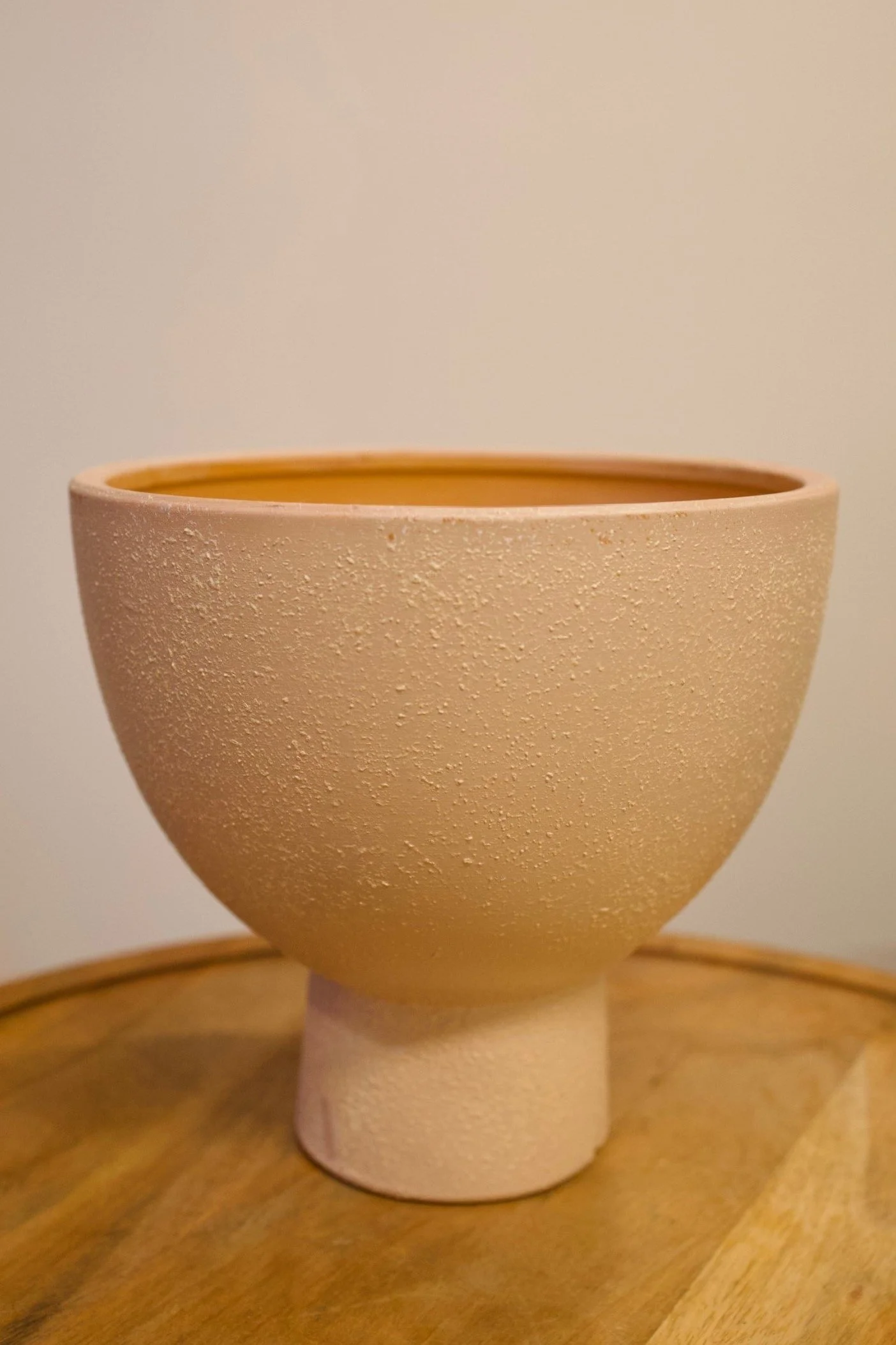 Tan textured clay terracota pot