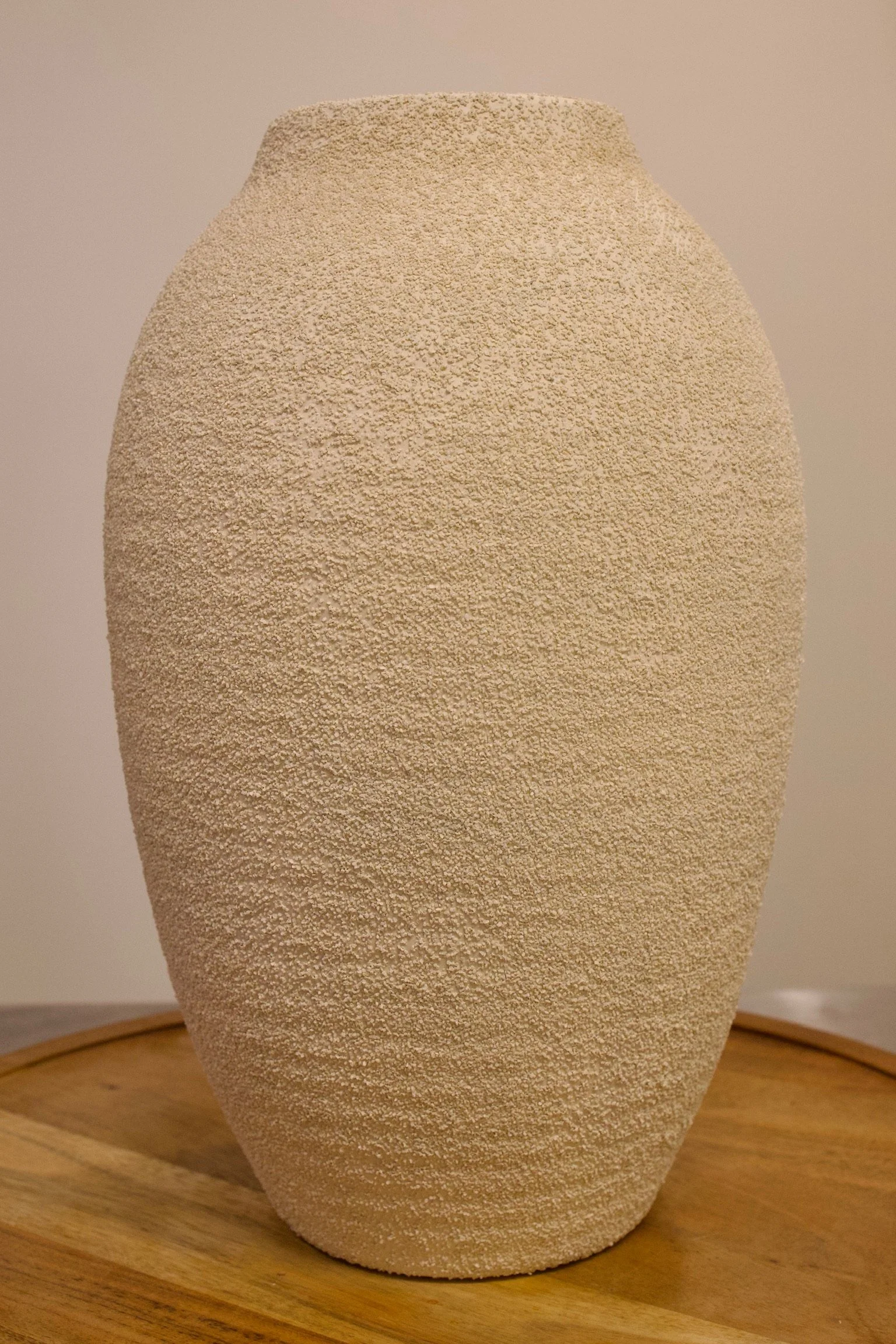 Tan textured ceramic floor vase