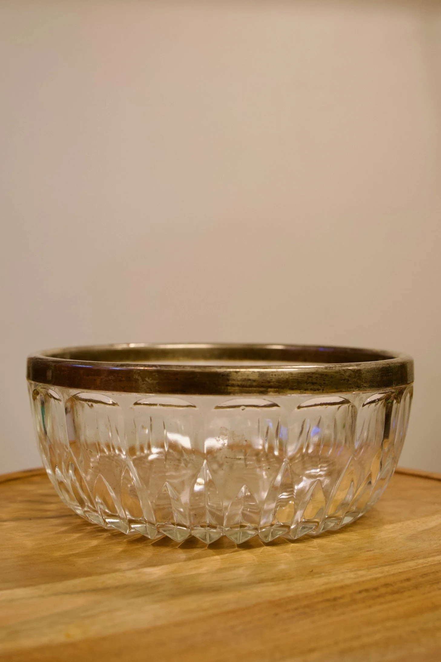 Glass antique bowl with silver metal edge