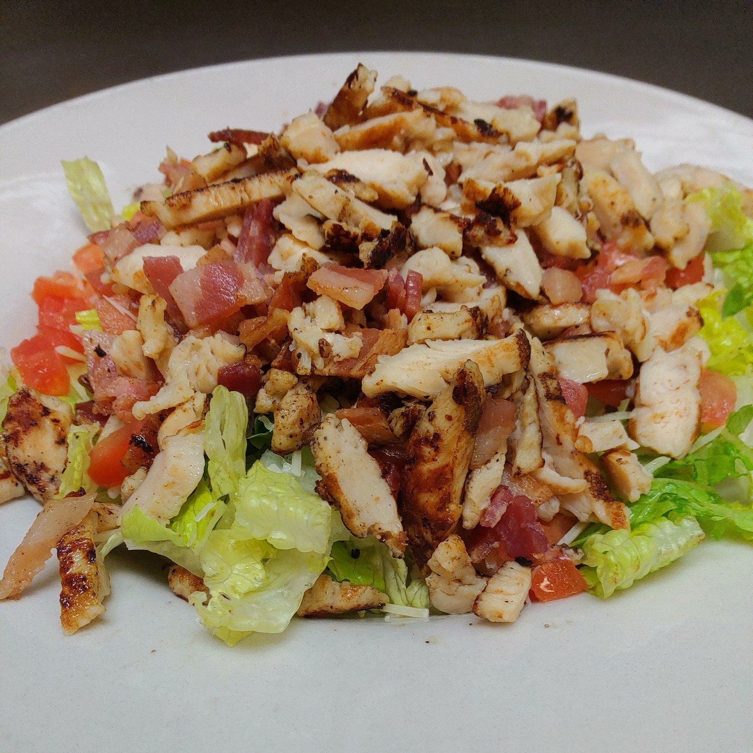 🥗 Crunch into our BLT Chicken Caesar Salad! Fresh greens, crispy bacon bits, parmesan, croutons, tomatoes, and grilled chicken, all with Caesar dressing on the side. It's a fresh take on a classic favorite.

#dreezrestaurant #homemeansnevada #lunchb