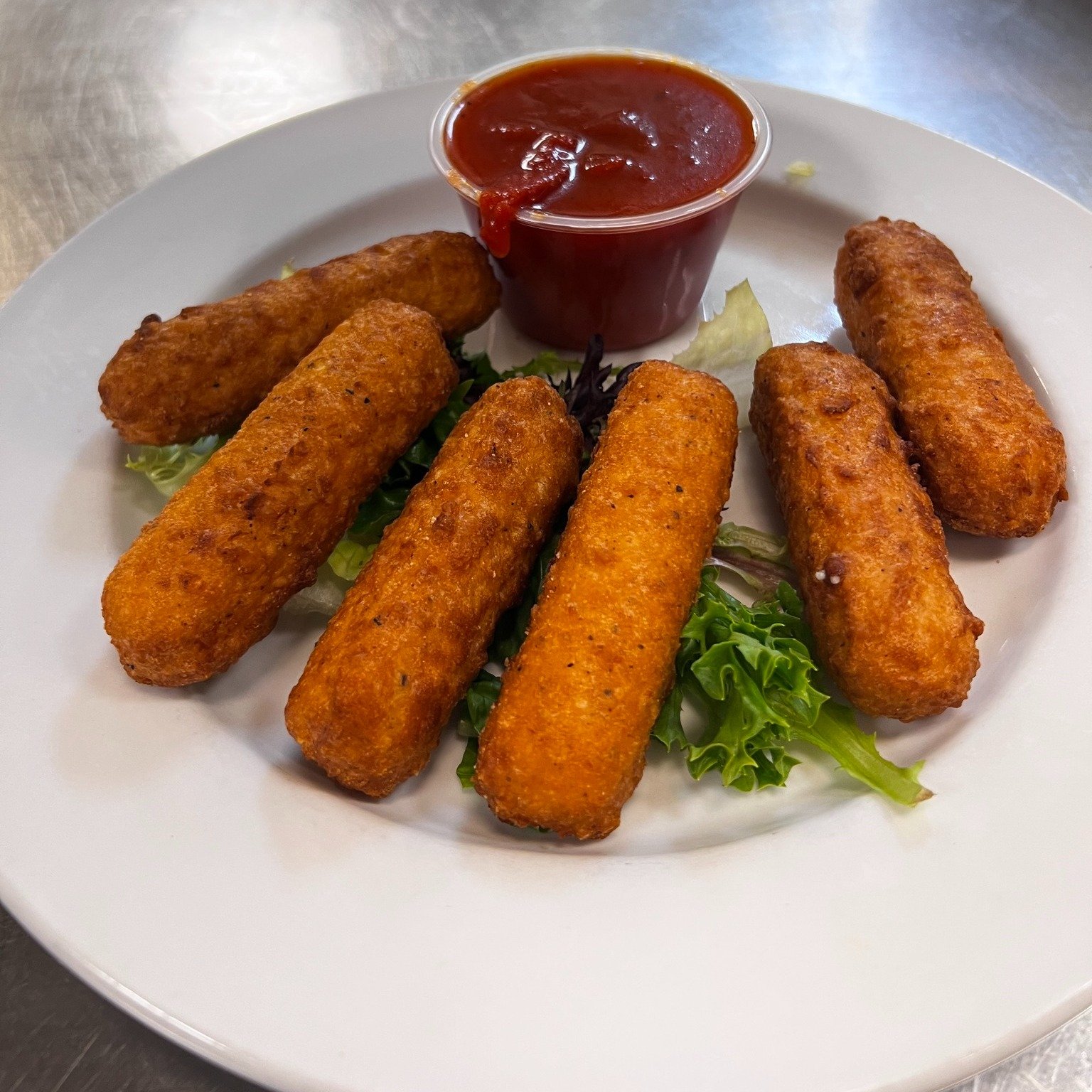 Crispy on the outside, gooey on the inside! 🧀 Dive into our Mozzarella Sticks for the perfect start to your meal at Dreez.

🕗 7am &ndash; 2pm

#localrestaurant #restaurant #homemeansnevada #lunchbreak #eatlocal #elkonevada #elko