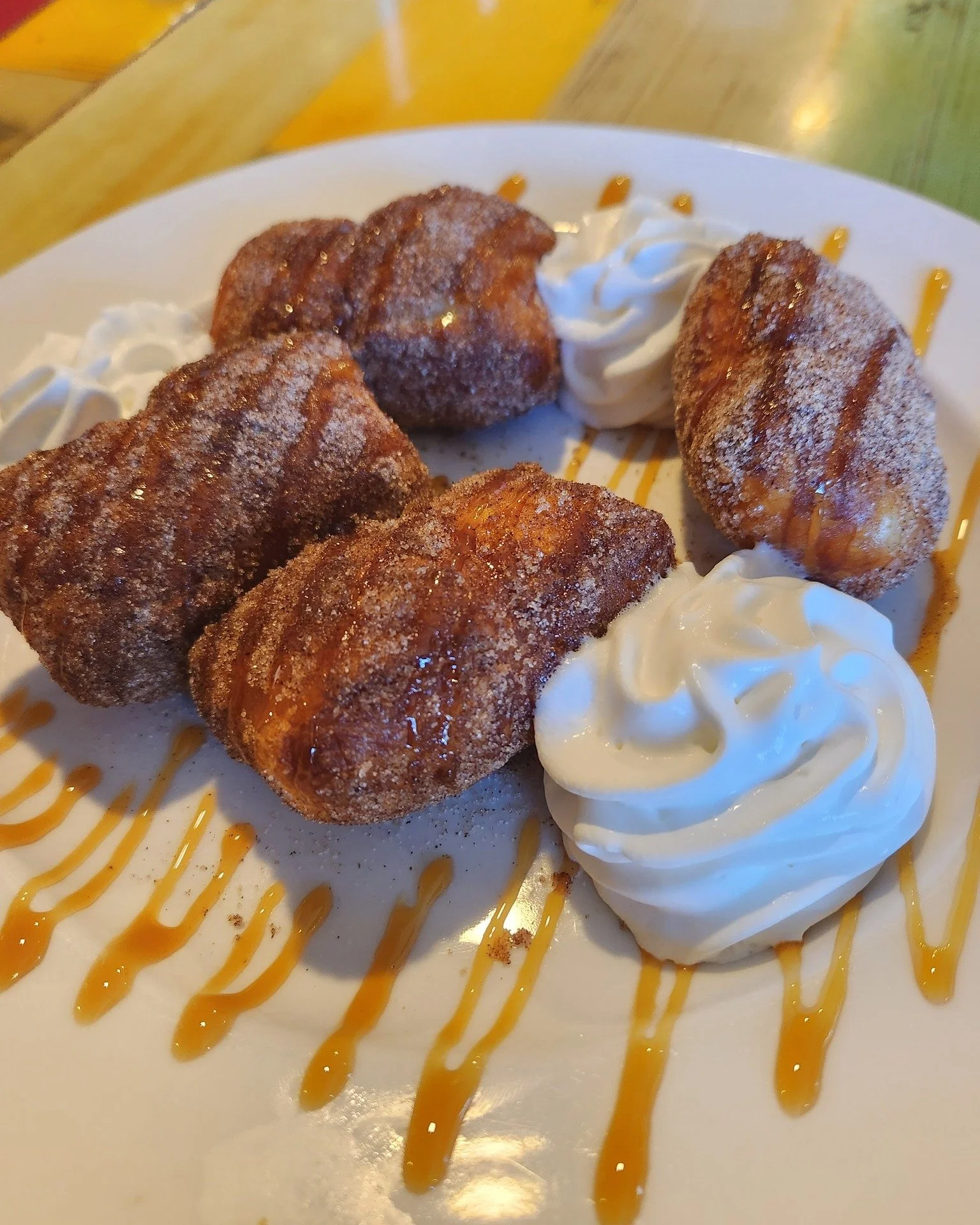 No jokes here&mdash;just pure, powdered sugar bliss.  It might be April Fools' Day, but our Beignets are the real deal. Four warm beignets tossed in cinnamon sugar, drizzled with caramel, and topped with whipped cream.

Come get a taste of the best &