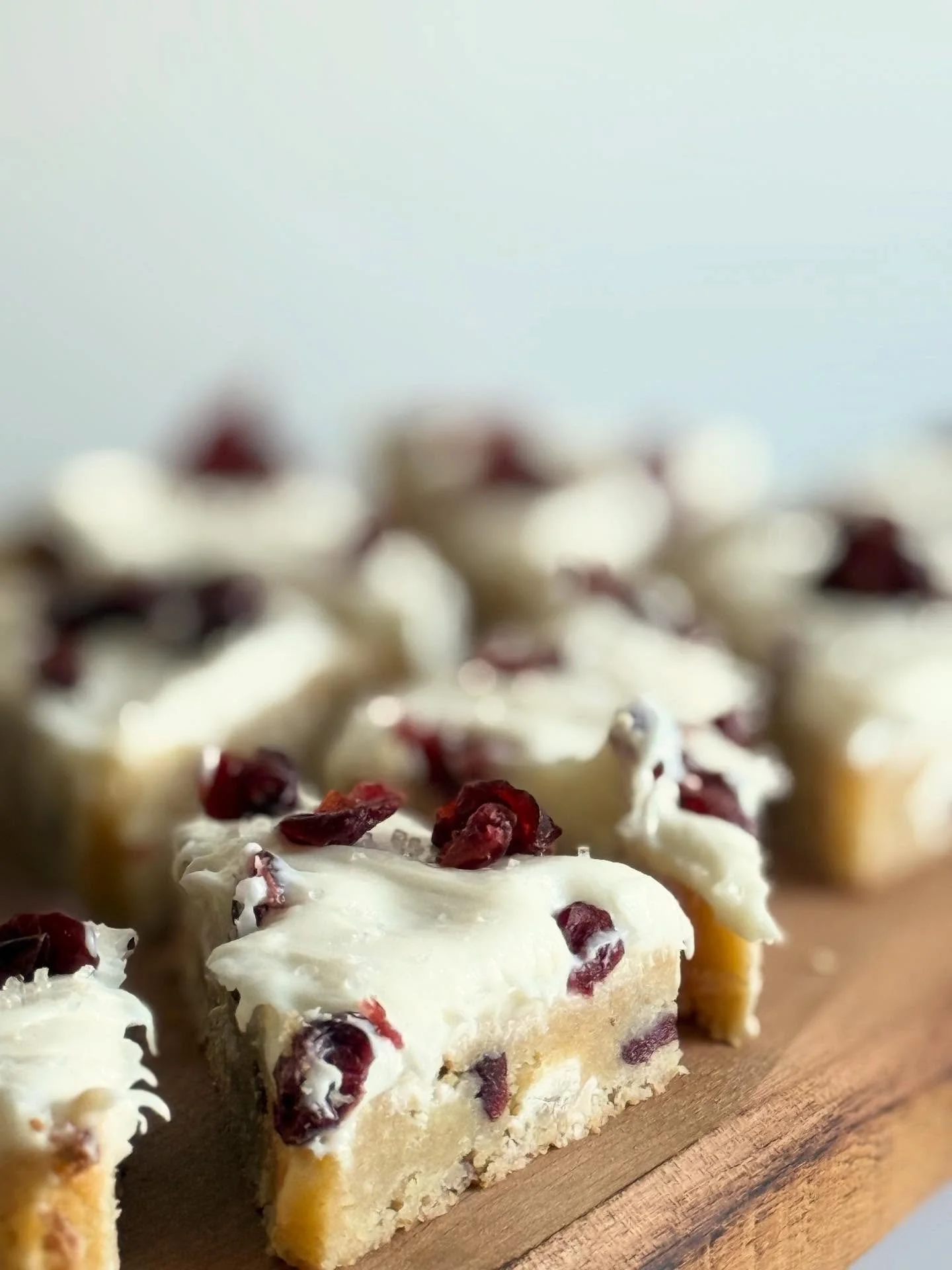 DAY 1 of the seasonal holiday menu ‼️ 

C R A N B E R R Y  B L I S S  B A R S

A soft, chewy blondie base, white chocolate chunks, bursts of cranberry, a hint of orange, and that silky cream-cheese topping you already know you&rsquo;re obsessed with.
