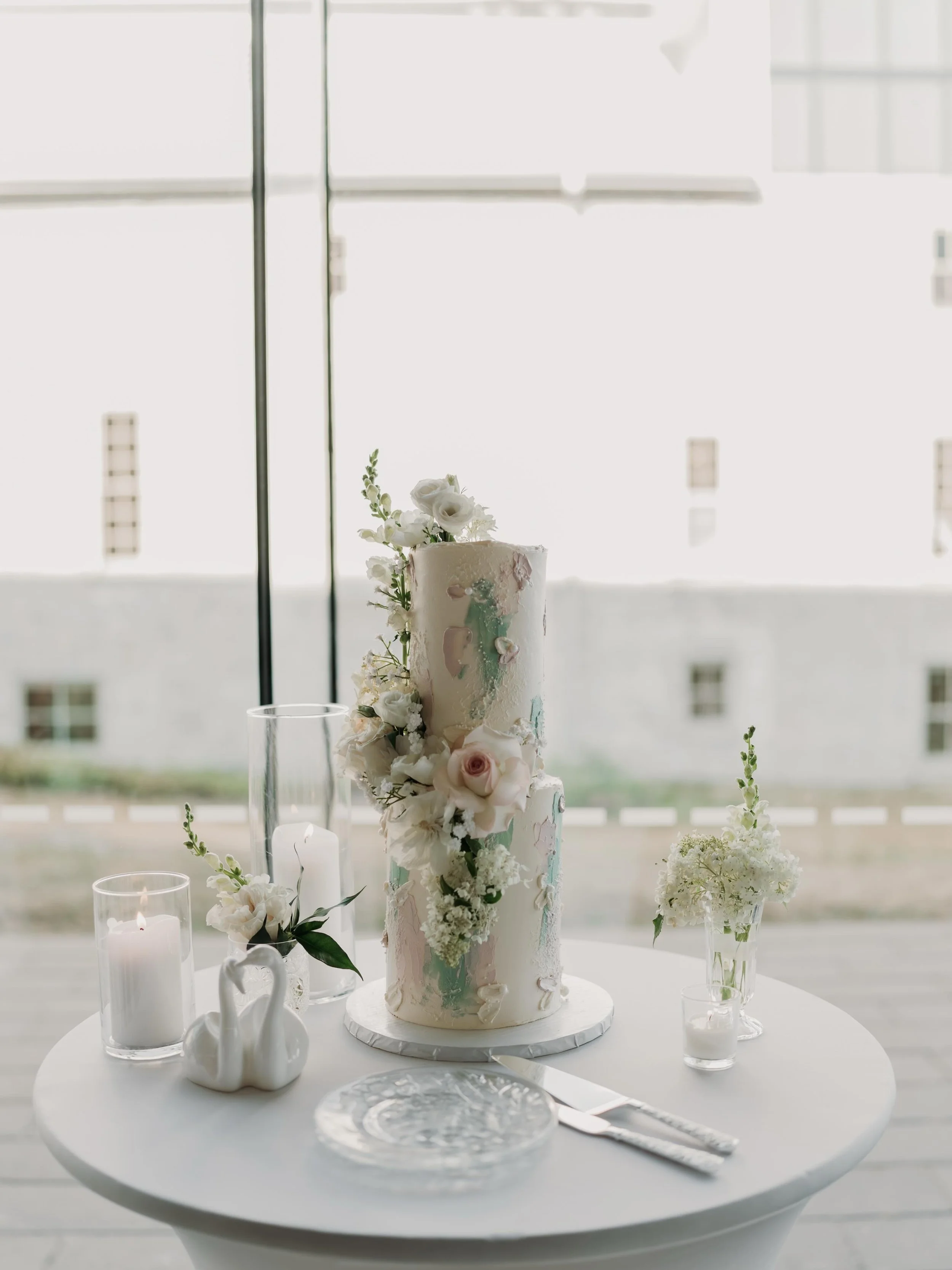 Everything gets quiet for the cake-cutting. One slice later, everyone&rsquo;s smiling. It&rsquo;s the sweetest little moment.
