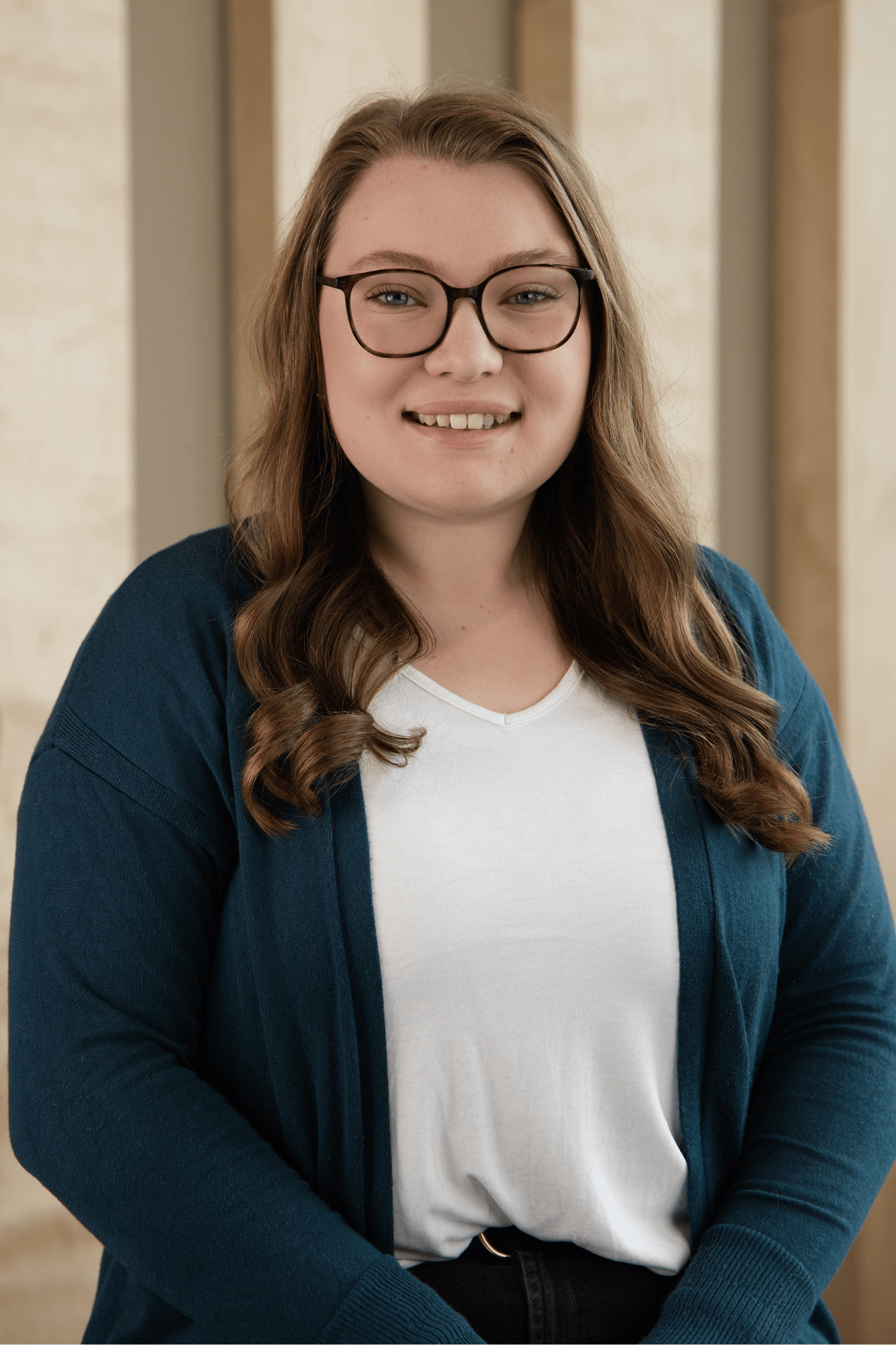 Mackenzie Reinhold, Assistant Director