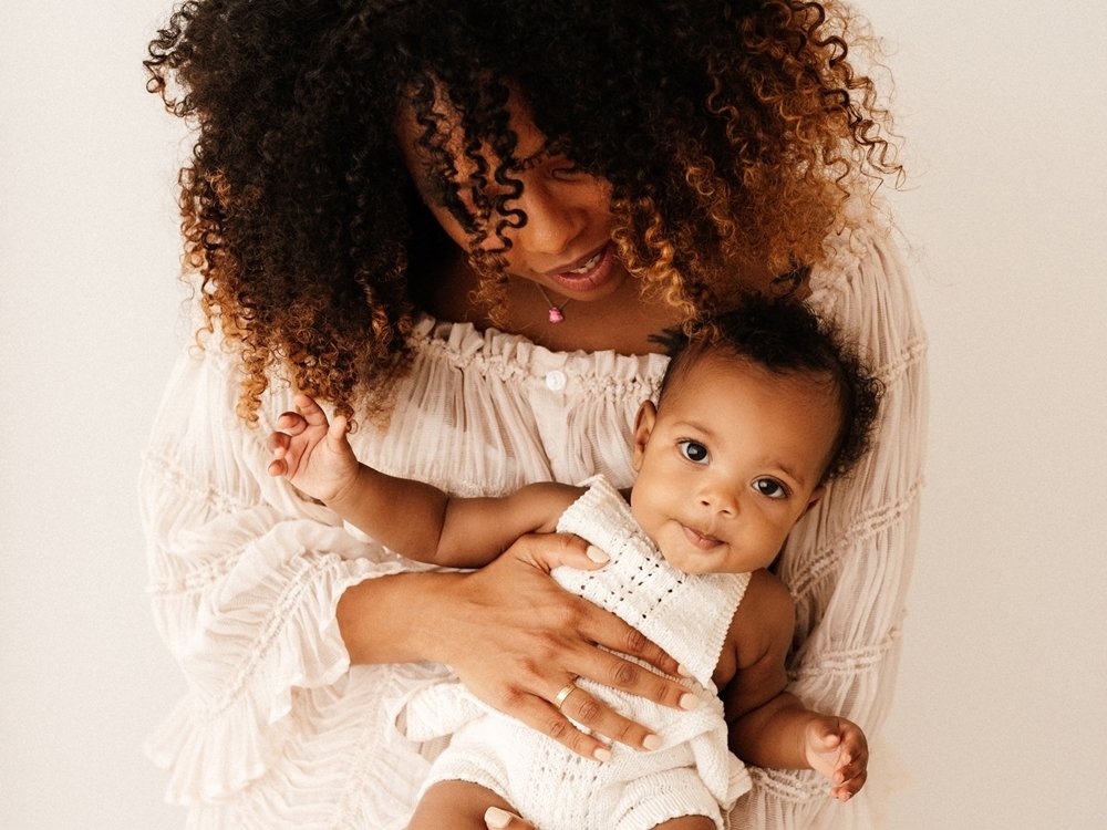 Sunshine Coast family photographer photographs mother and child together in the studio.