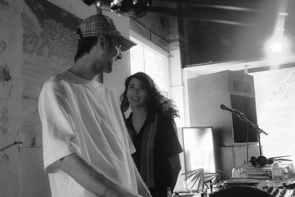 A performer setting up at High Note