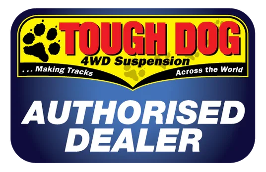 Tough Dog 4WD suspension authorized dealer sign featuring a black paw print and yellow, red, blue, and black colors.