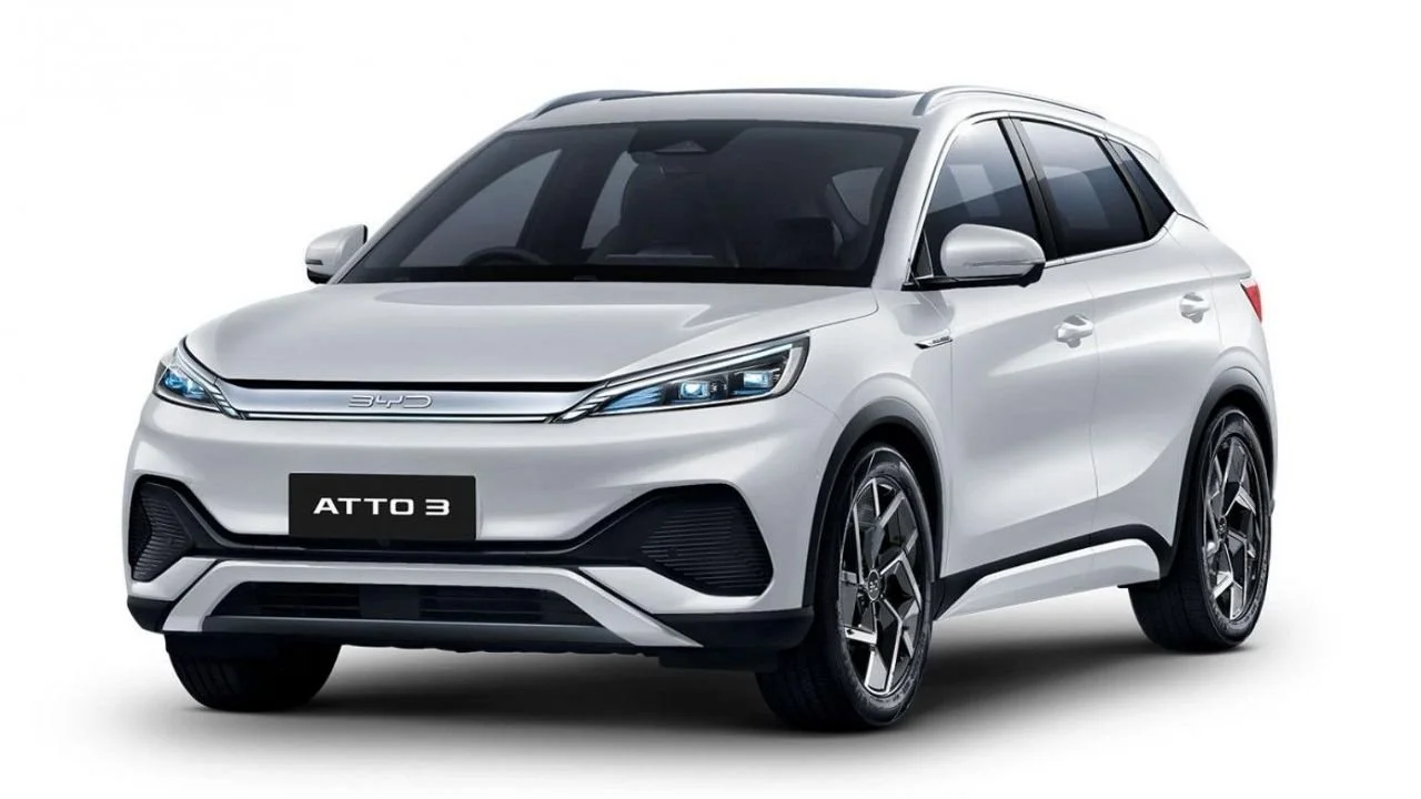 A silver BYD Atto 3 compact SUV with sleek design, black and silver multi-spoke wheels, tinted windows, and modern headlights, shown against a plain white background.