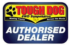 Tough Dog 4WD suspension authorized dealer sticker with black paw print, yellow and red logo, and blue background.
