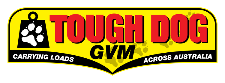 Logo for Tough Dog Gym featuring a black paw print inside a black weight. Text reads 'Tough Dog Gym' in large red letters, with 'Carrying Loads Across Australia' in smaller white letters on a black banner.