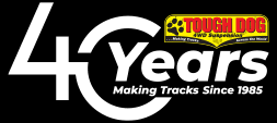 Logo celebrating 40 years of Tough Dog, a company making tracks since 1985.