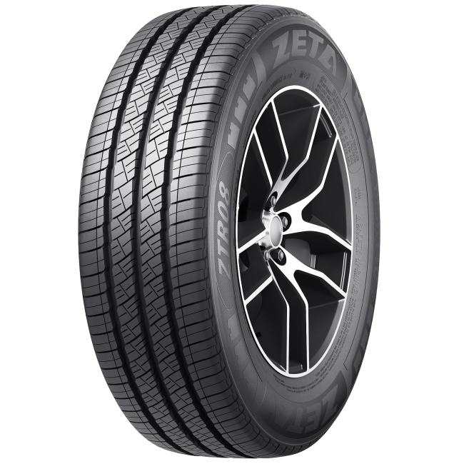 A black tire with silver rim and intricate spoke design, branded ZETR}}