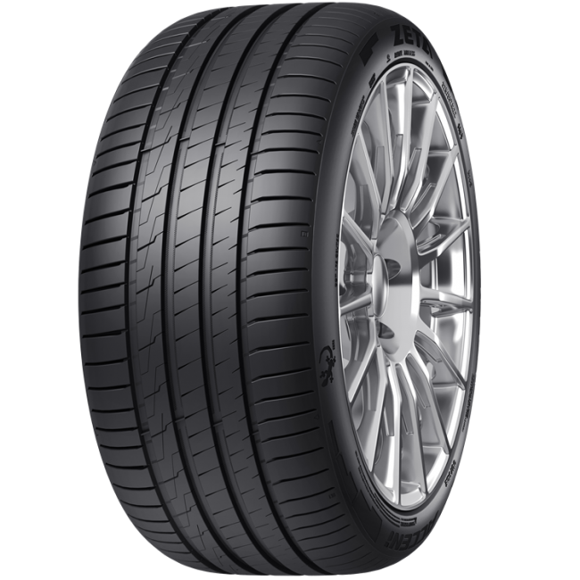 A close-up of a black car tire mounted on a silver alloy wheel, showing detailed tread pattern and sidewall design.
