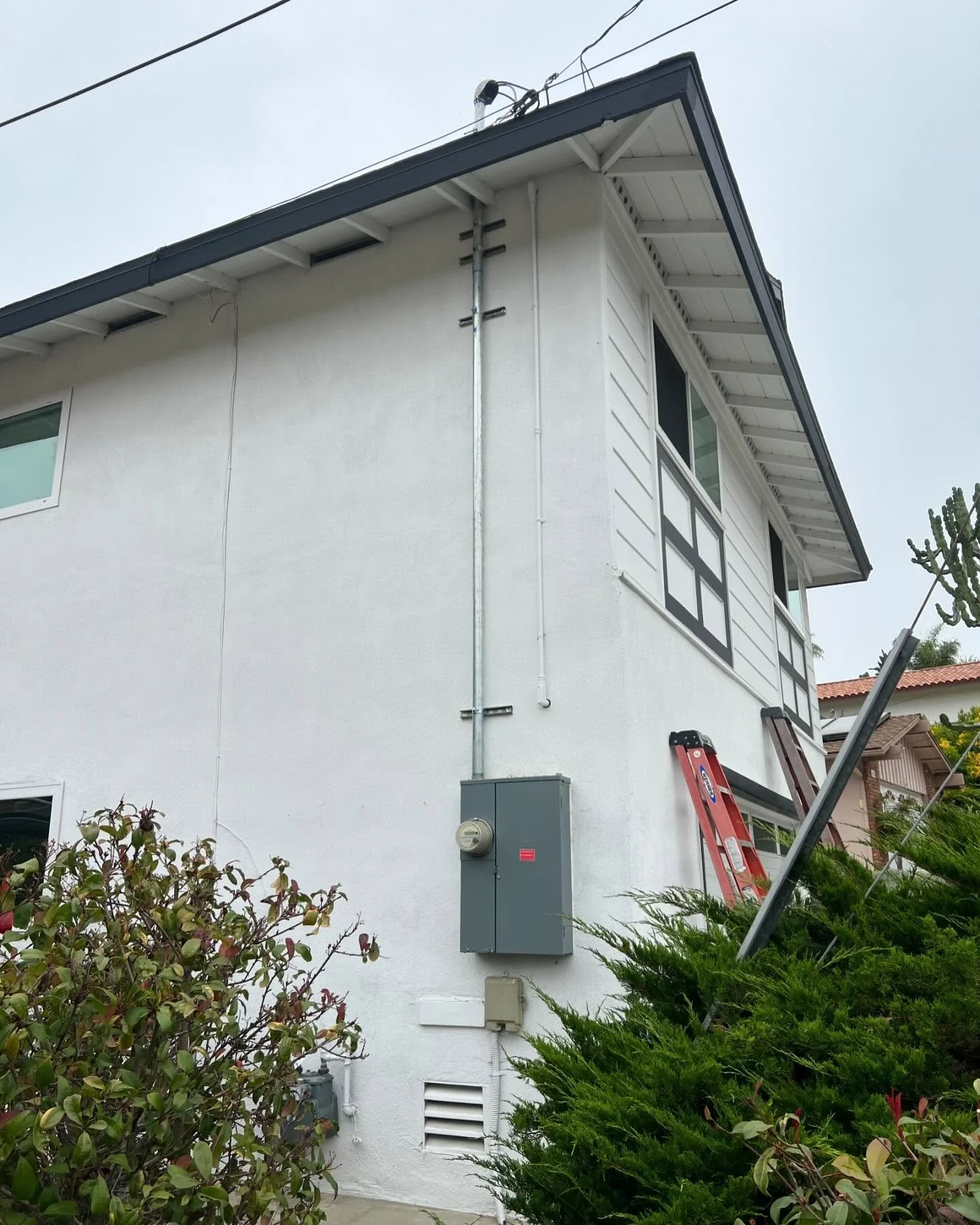 Panel upgrade at beach House. Two-story surface mounted panel It was a difficult one, but we got it done.