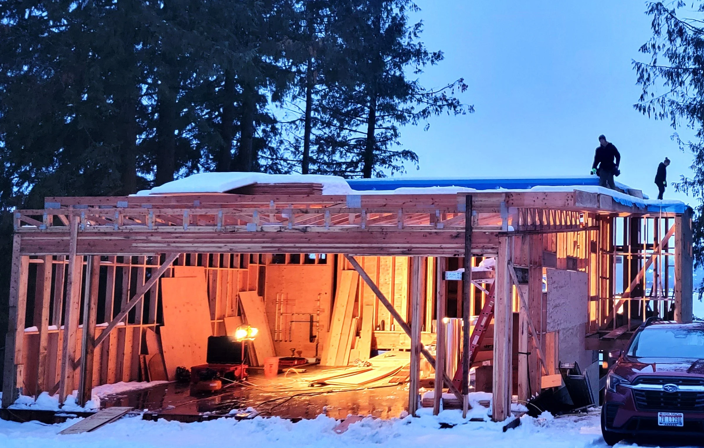 (Before) Sheathing, Blueskin House Wrap, Window Installation, Metal Board & Batten Siding, Metal Soffit & Fascia