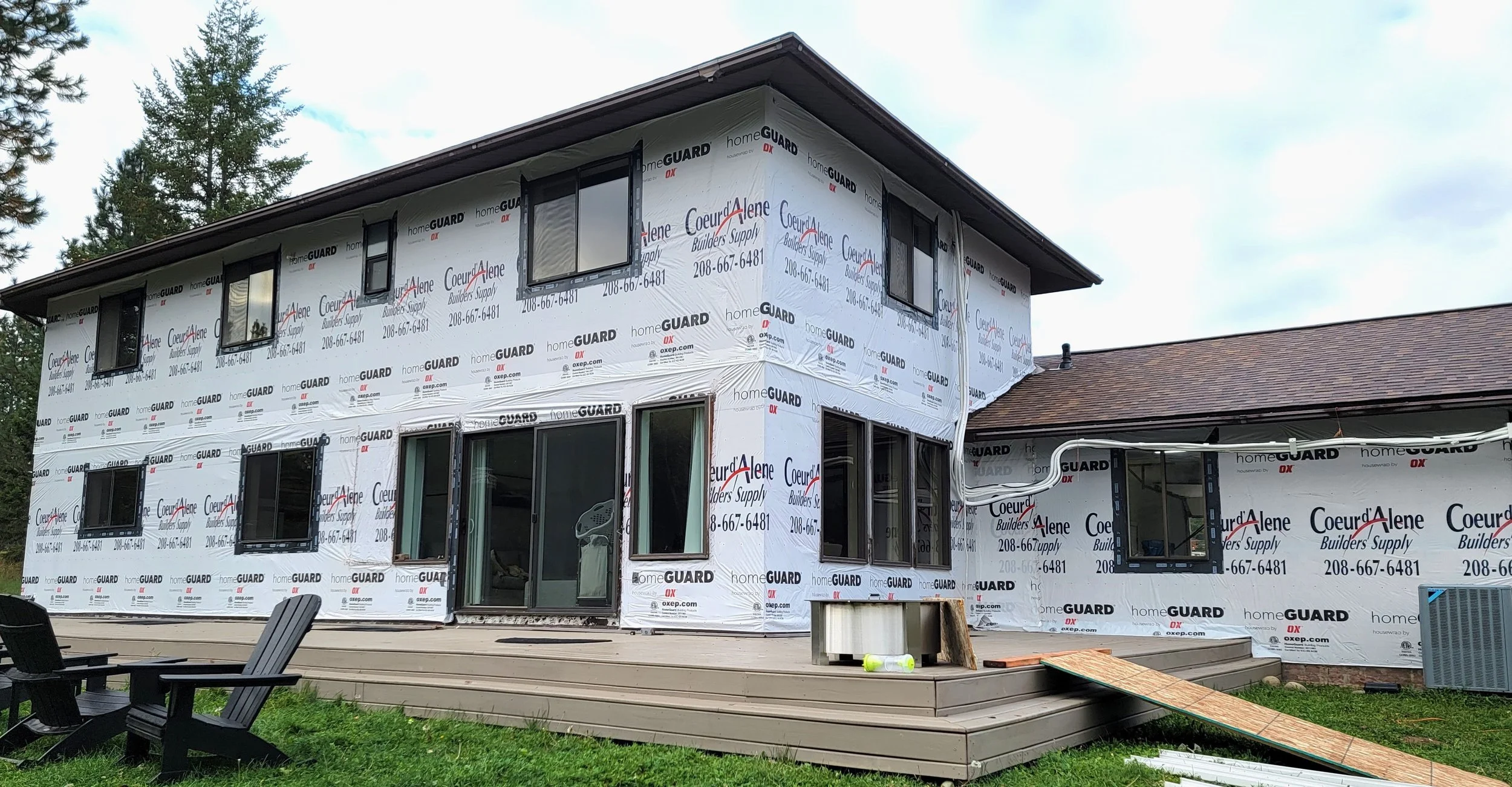(During) Re-side: Hardie Board & Batten, Cedar Shiplap on Sunroom, Hardie Shake Accents, LP Trim & Soffits, Cedar Tongue & Groove Soffits