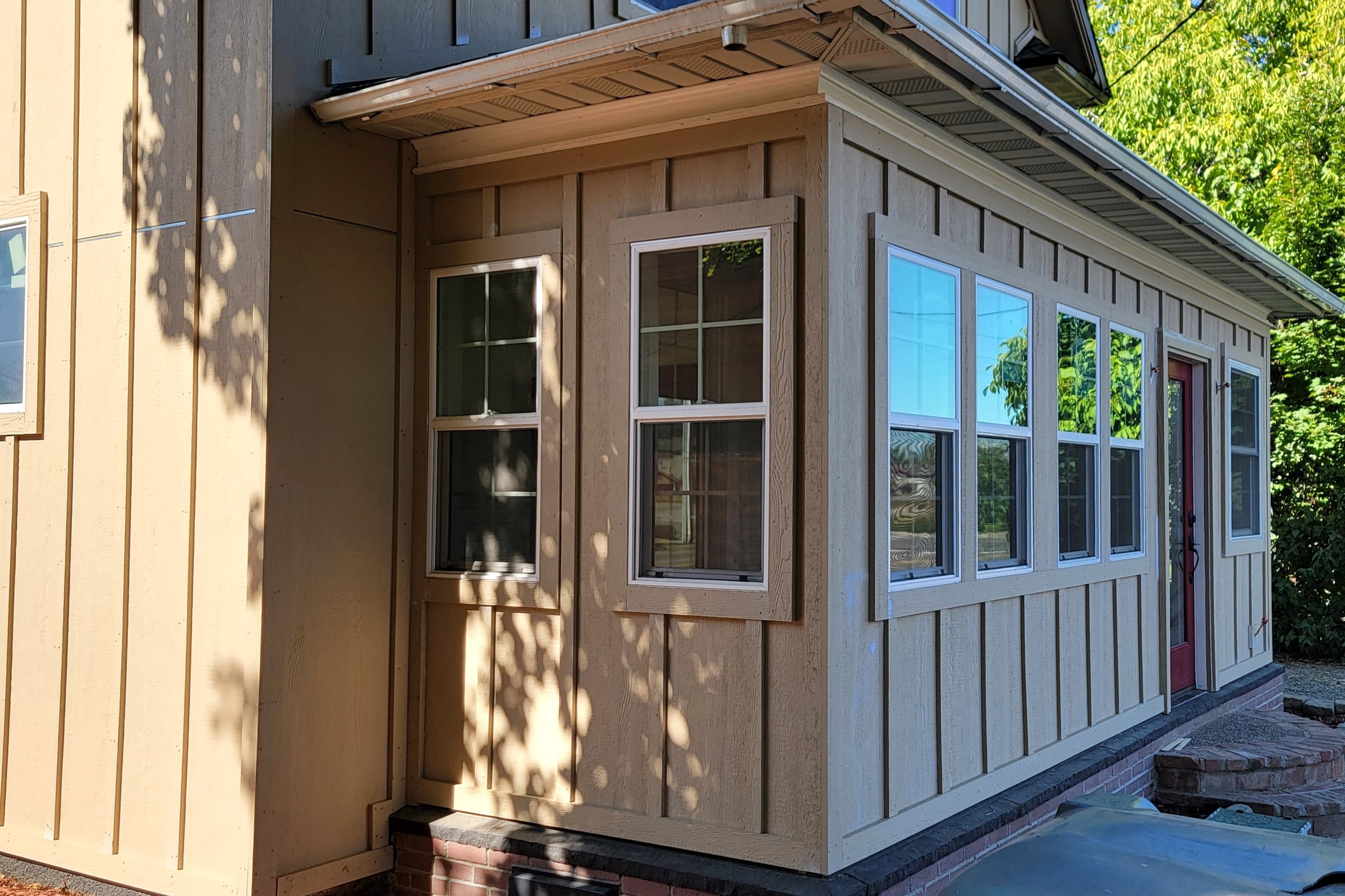 (After) LP Board & Batten Re-Side, Window Replacements, LP Soffit & Fascia