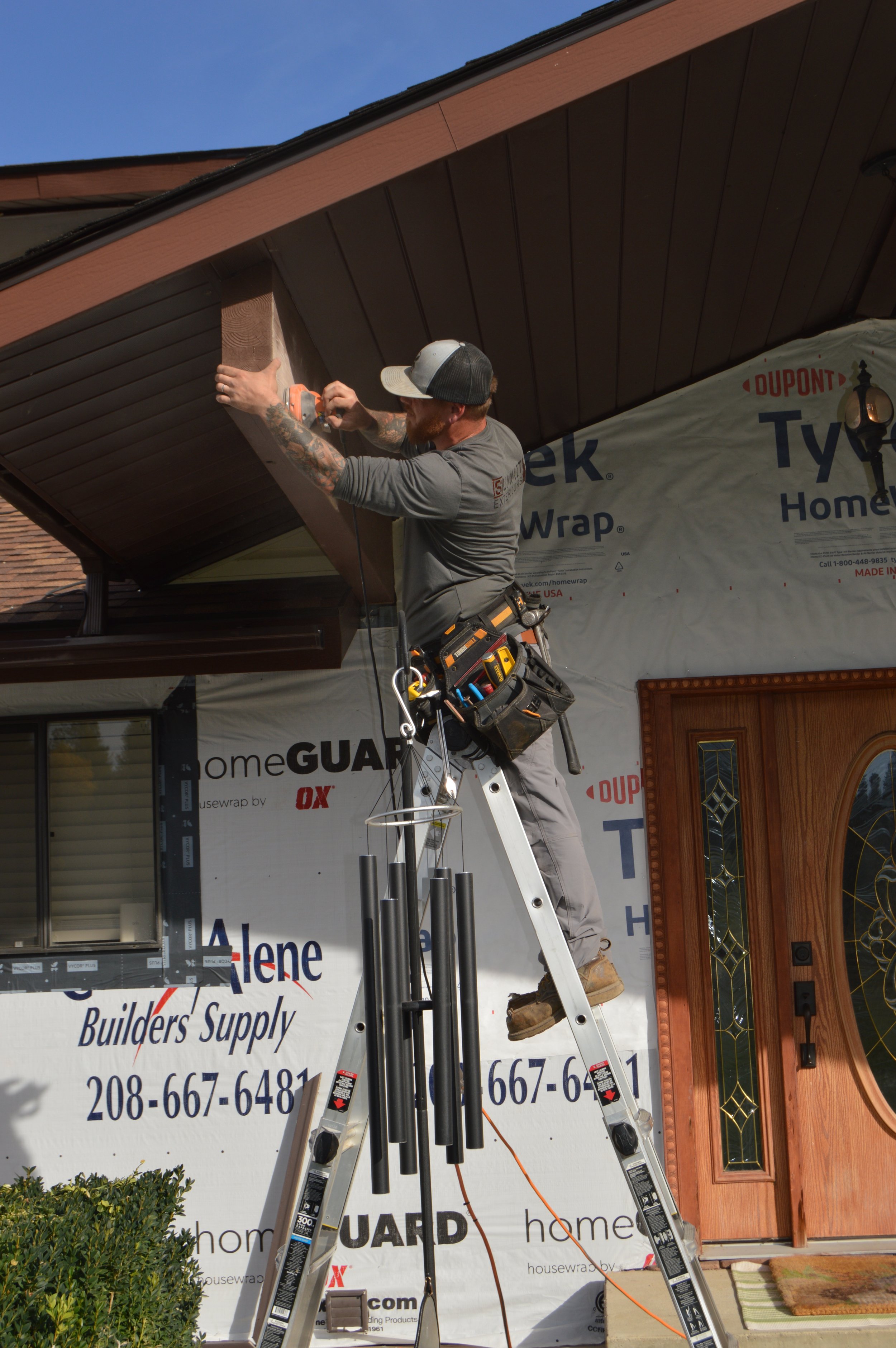 (During) Re-side: Hardie Board & Batten, Cedar Shiplap on Sunroom, Hardie Shake Accents, LP Trim & Soffits, Cedar Tongue & Groove Soffits