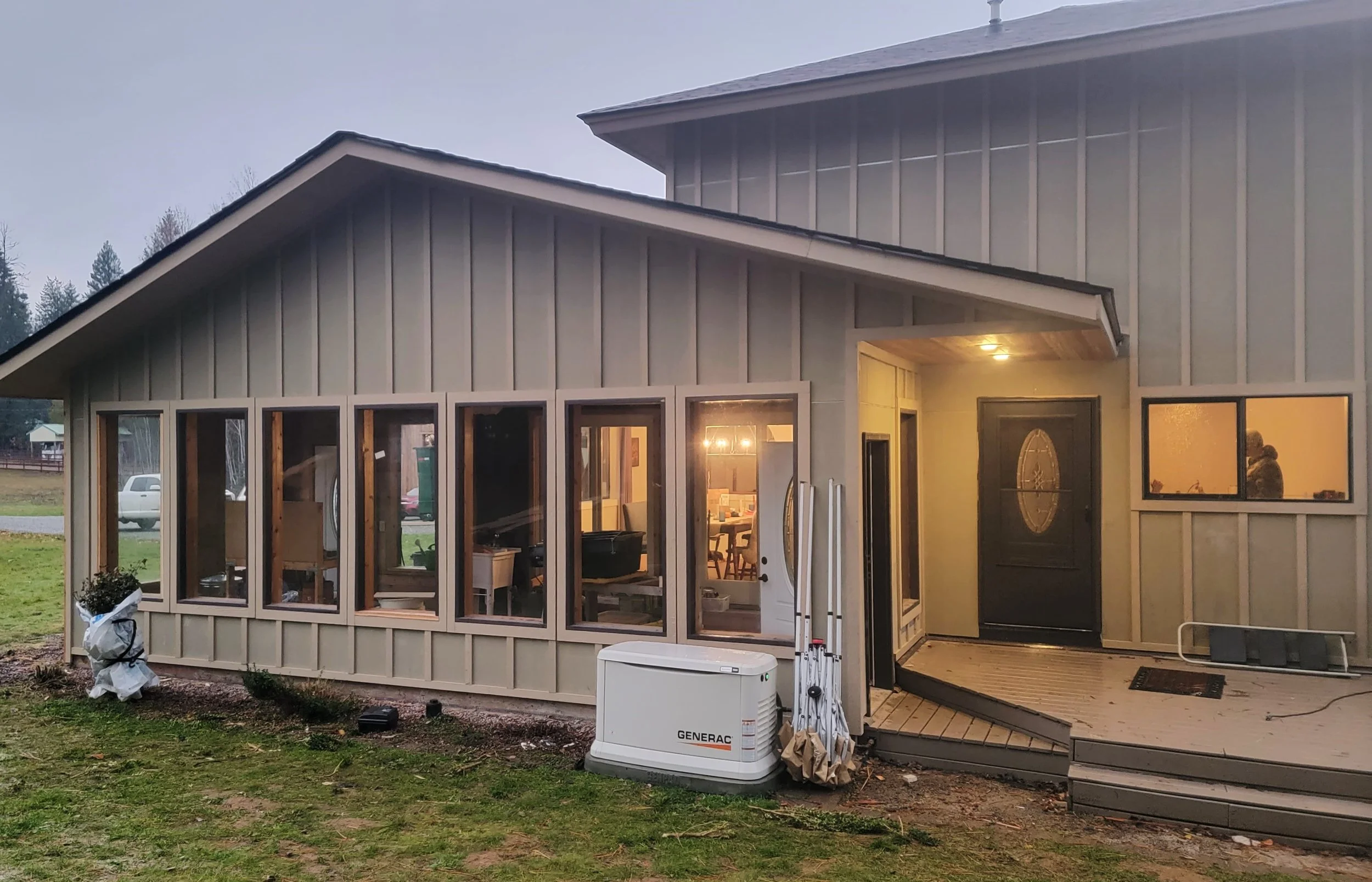 (During) Re-side: Hardie Board & Batten, Cedar Shiplap on Sunroom, Hardie Shake Accents, LP Trim & Soffits, Cedar Tongue & Groove Soffits